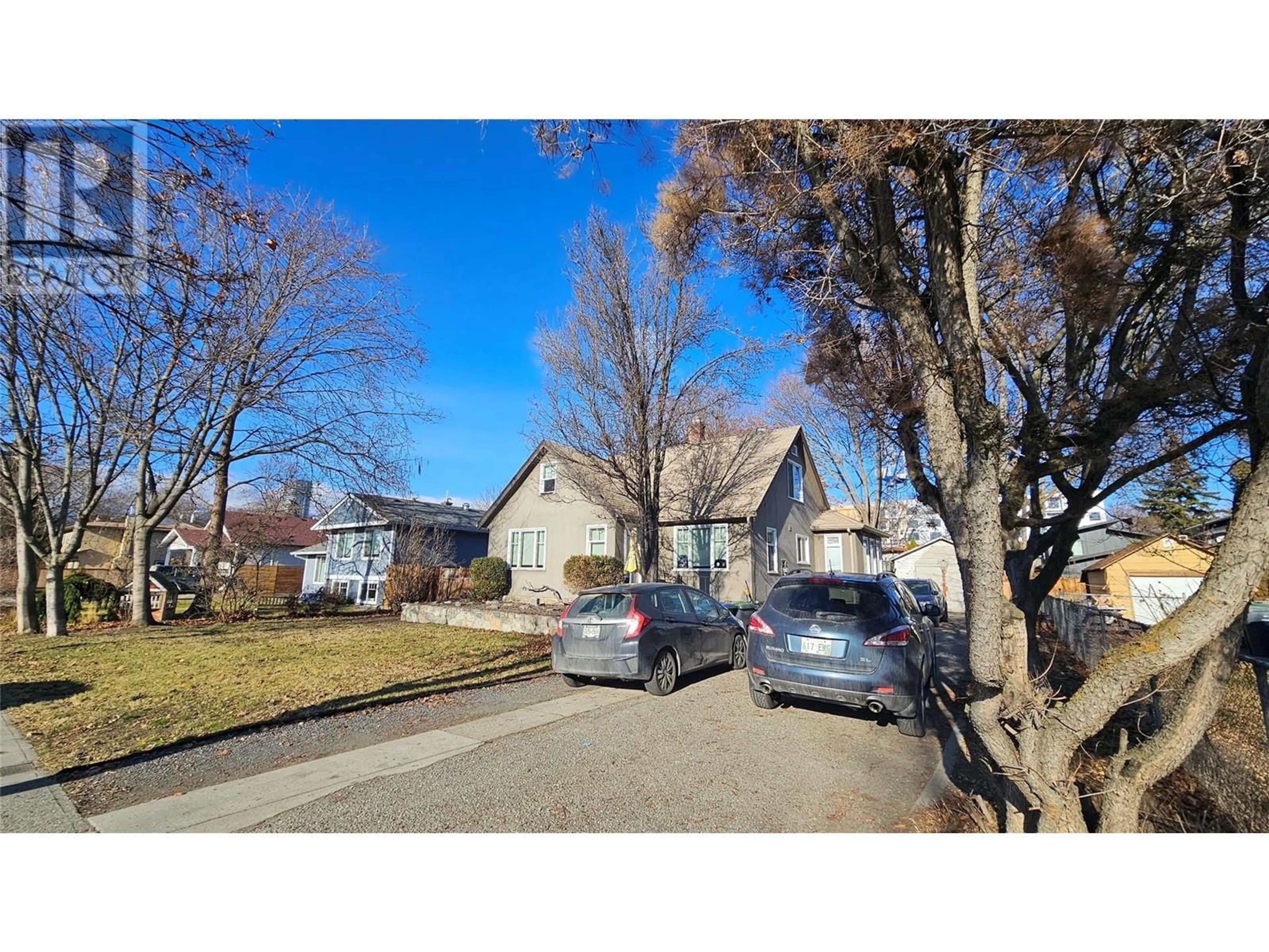 A pic from outside/outdoor area/front of a property/back of a property/a pic from drone, street for 818 Dehart Avenue, Kelowna British Columbia V1Y6A1