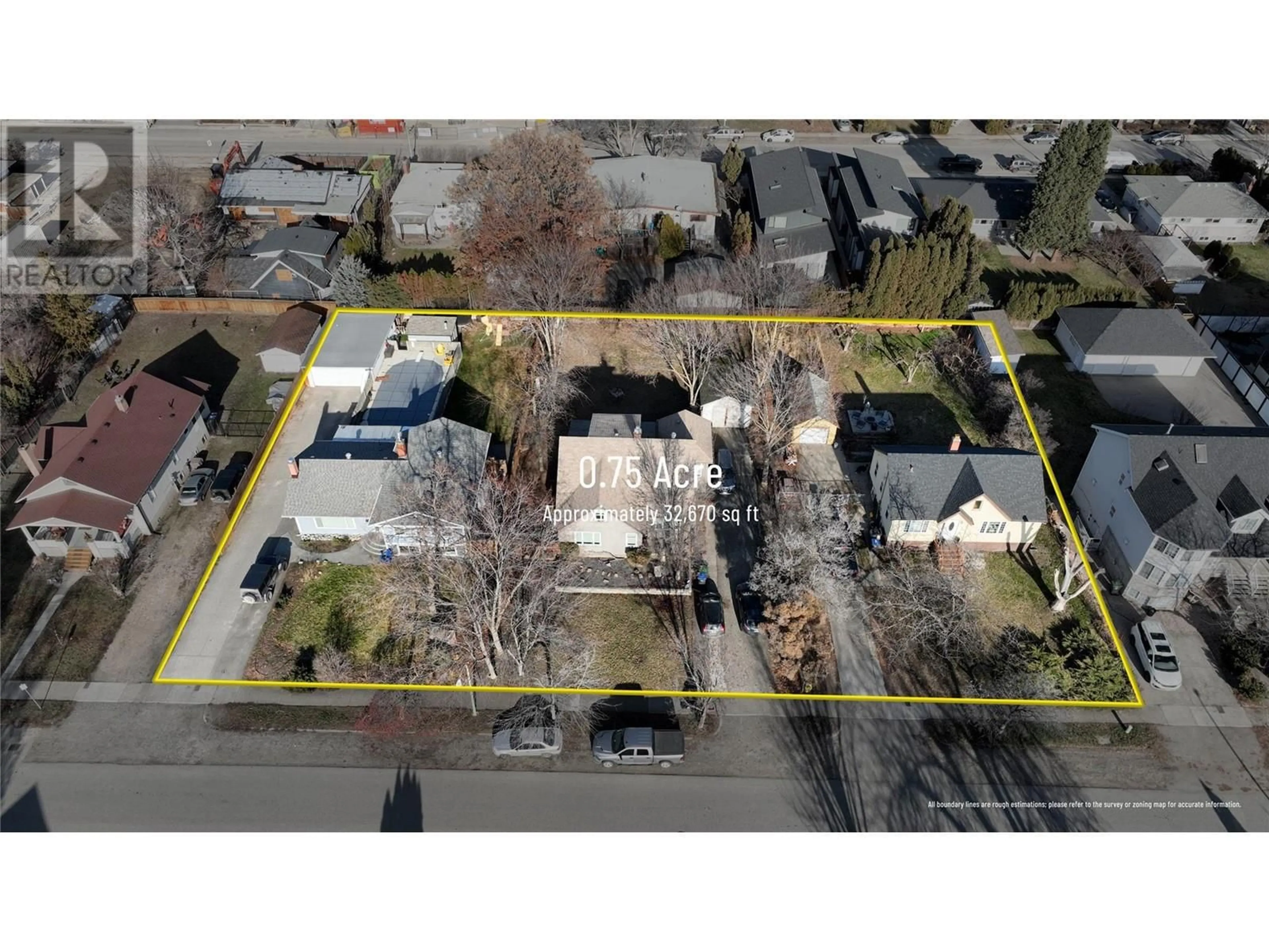 A pic from outside/outdoor area/front of a property/back of a property/a pic from drone, street for 818 Dehart Avenue, Kelowna British Columbia V1Y6A1