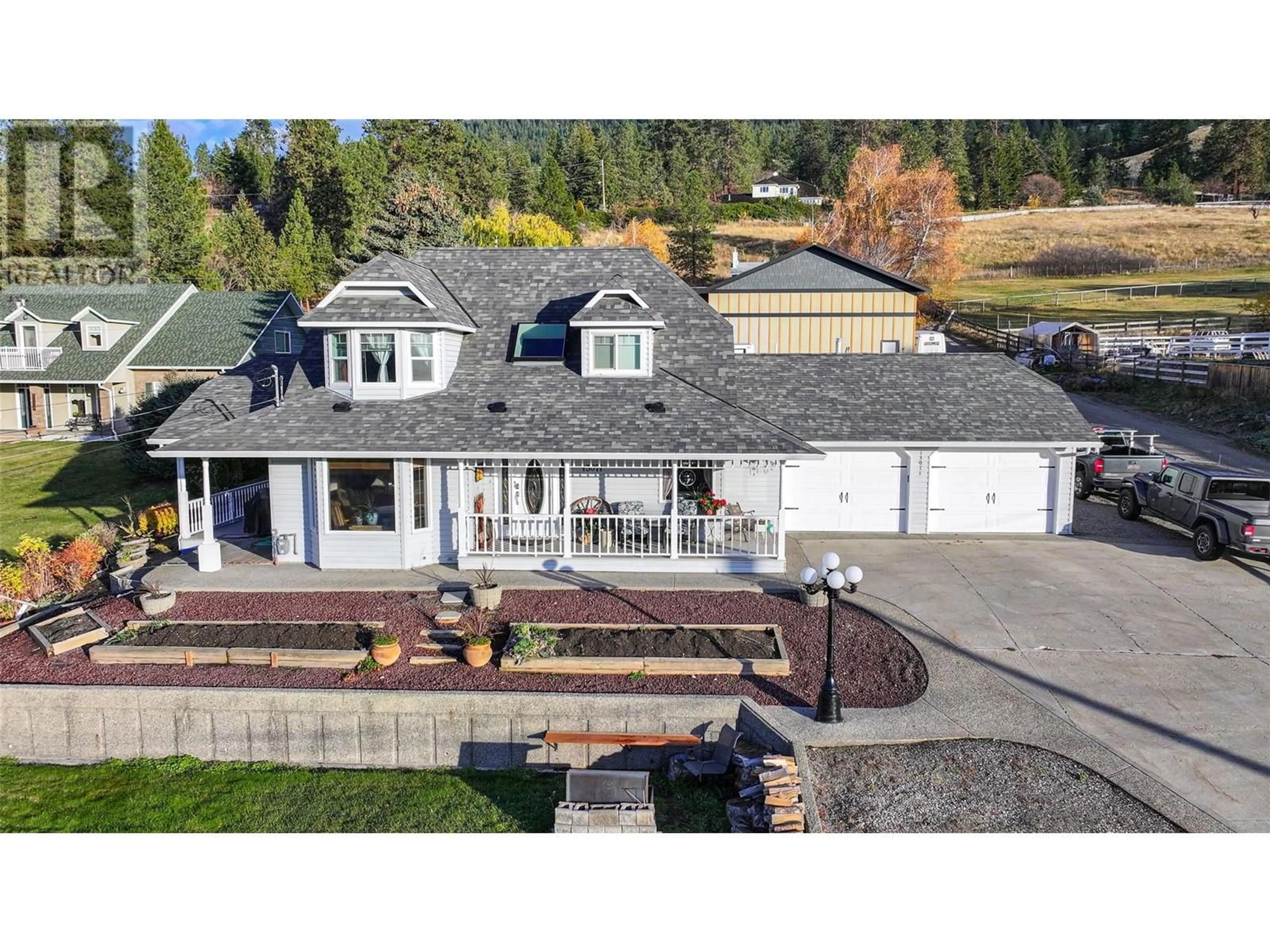 A pic from outside/outdoor area/front of a property/back of a property/a pic from drone, unknown for 13071 Trewhitt Road E, Lake Country British Columbia V4V2B1