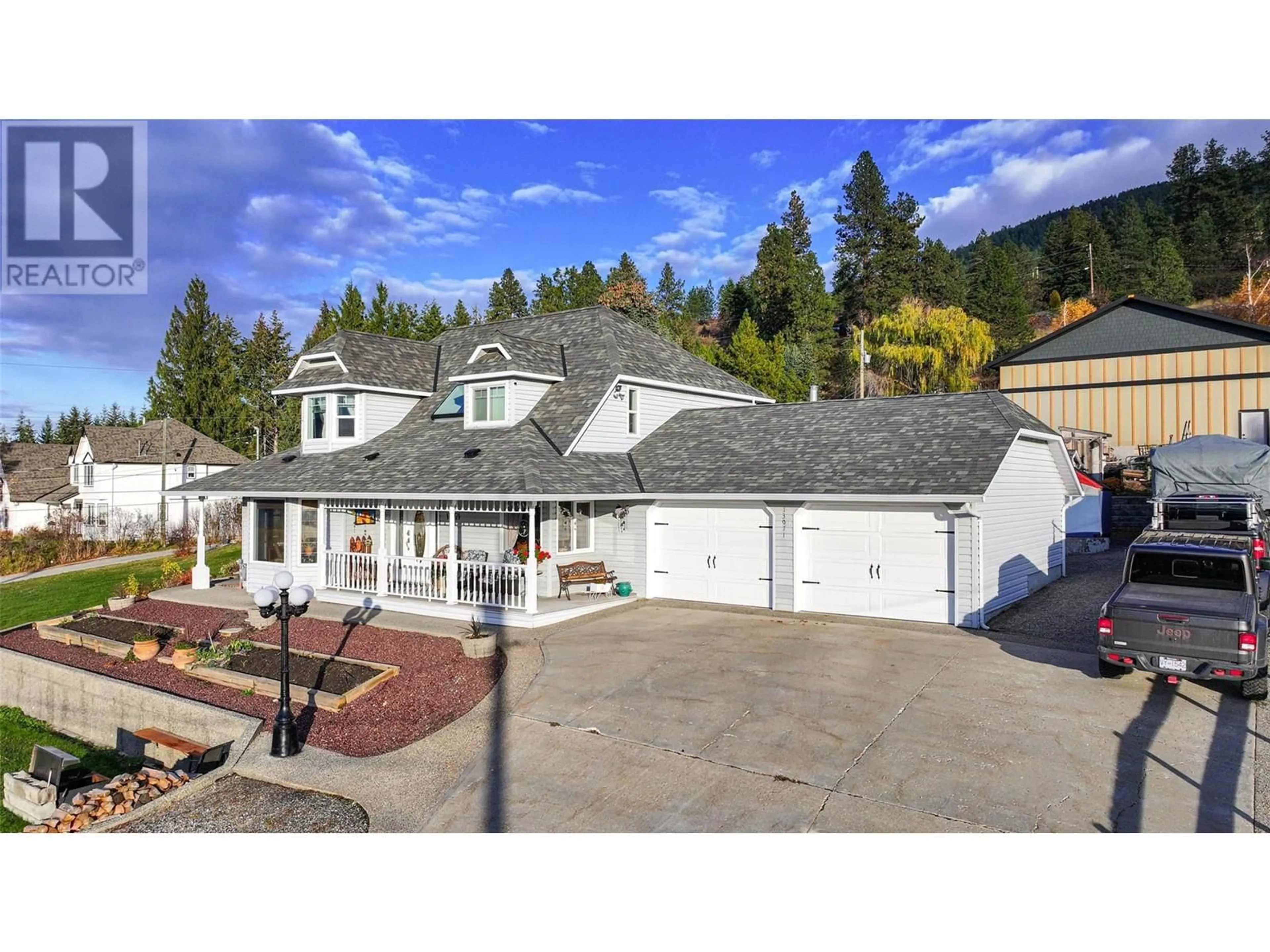 A pic from outside/outdoor area/front of a property/back of a property/a pic from drone, mountain view for 13071 Trewhitt Road E, Lake Country British Columbia V4V2B1