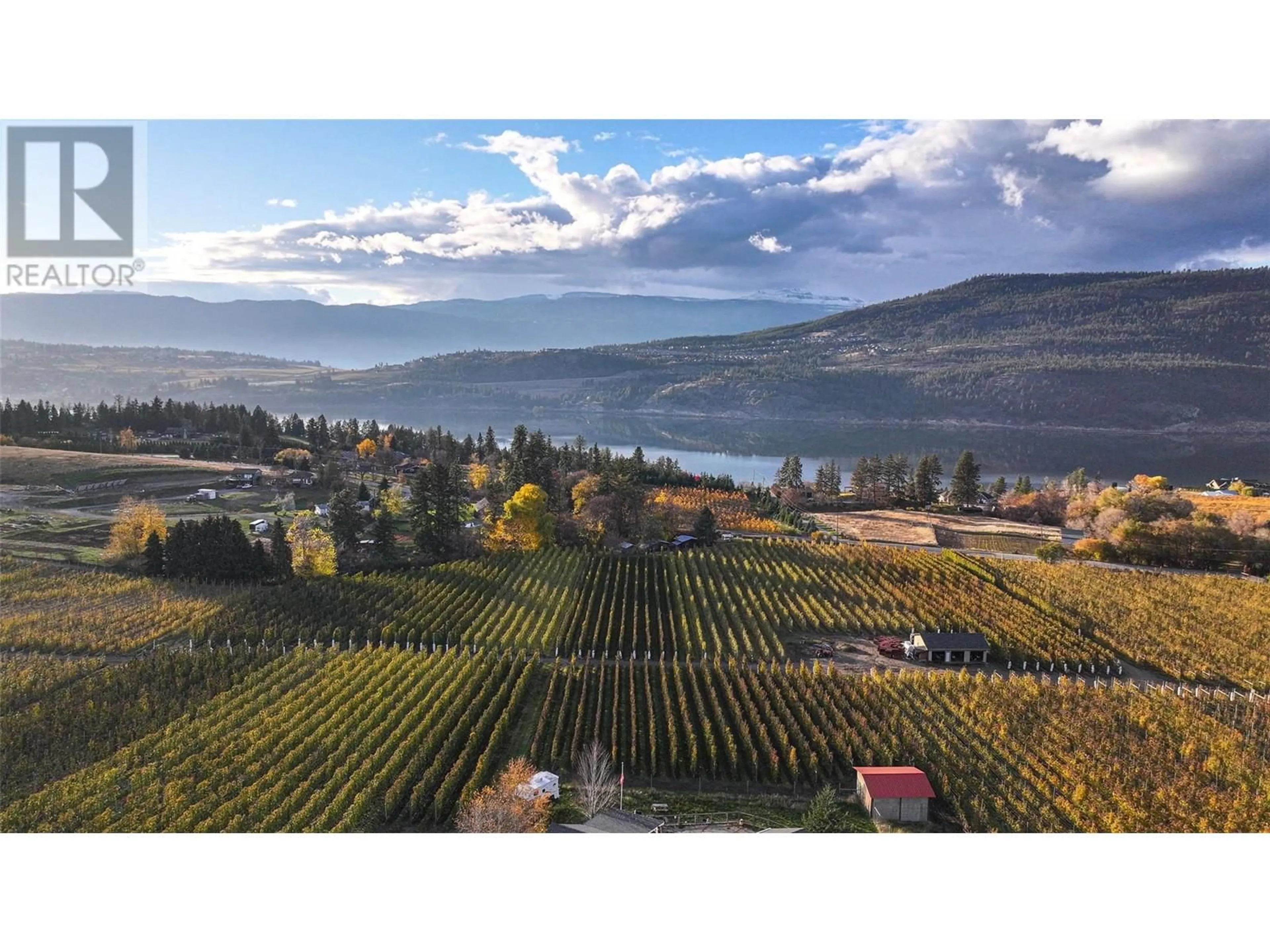 A pic from outside/outdoor area/front of a property/back of a property/a pic from drone, water/lake/river/ocean view for 13071 Trewhitt Road E, Lake Country British Columbia V4V2B1