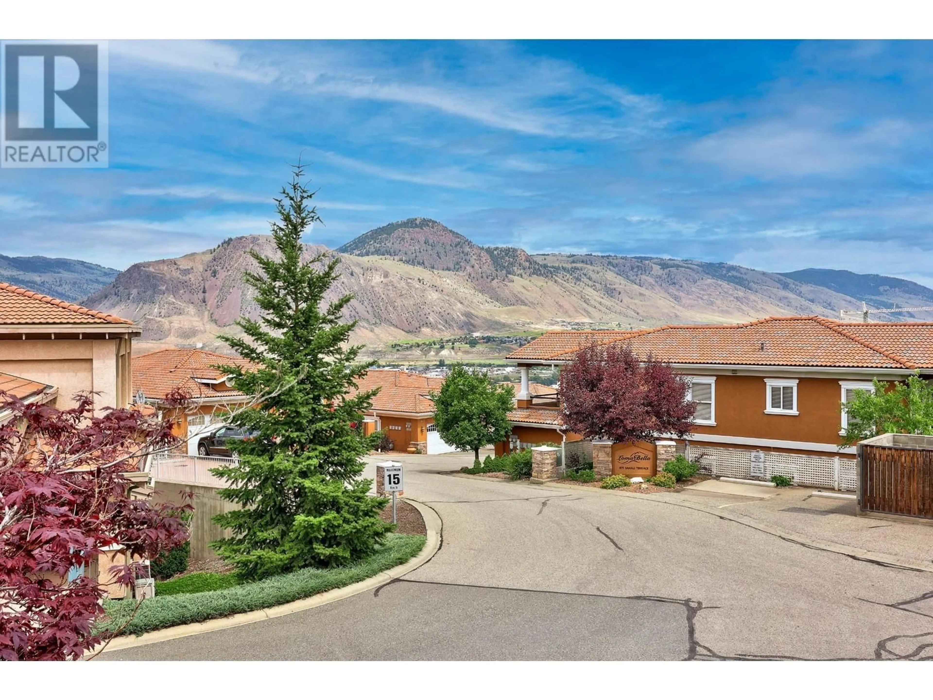 A pic from outside/outdoor area/front of a property/back of a property/a pic from drone, mountain view for 875 SAHALI Terrace Unit# 403, Kamloops British Columbia V2C6W8