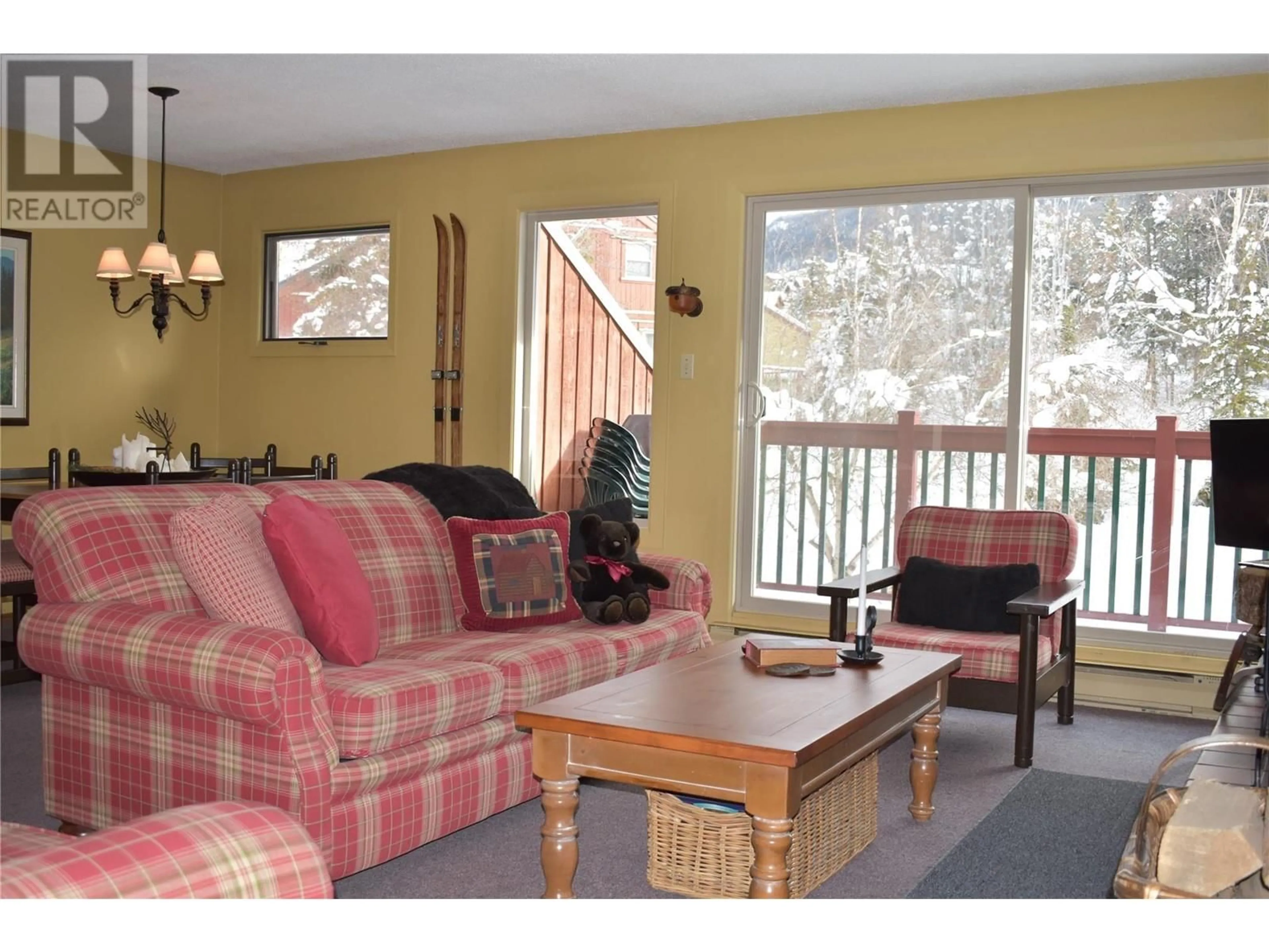 Living room with furniture, wood/laminate floor for 2030 Panorama Drive Unit# 707, Panorama Mountain British Columbia V0A1T0