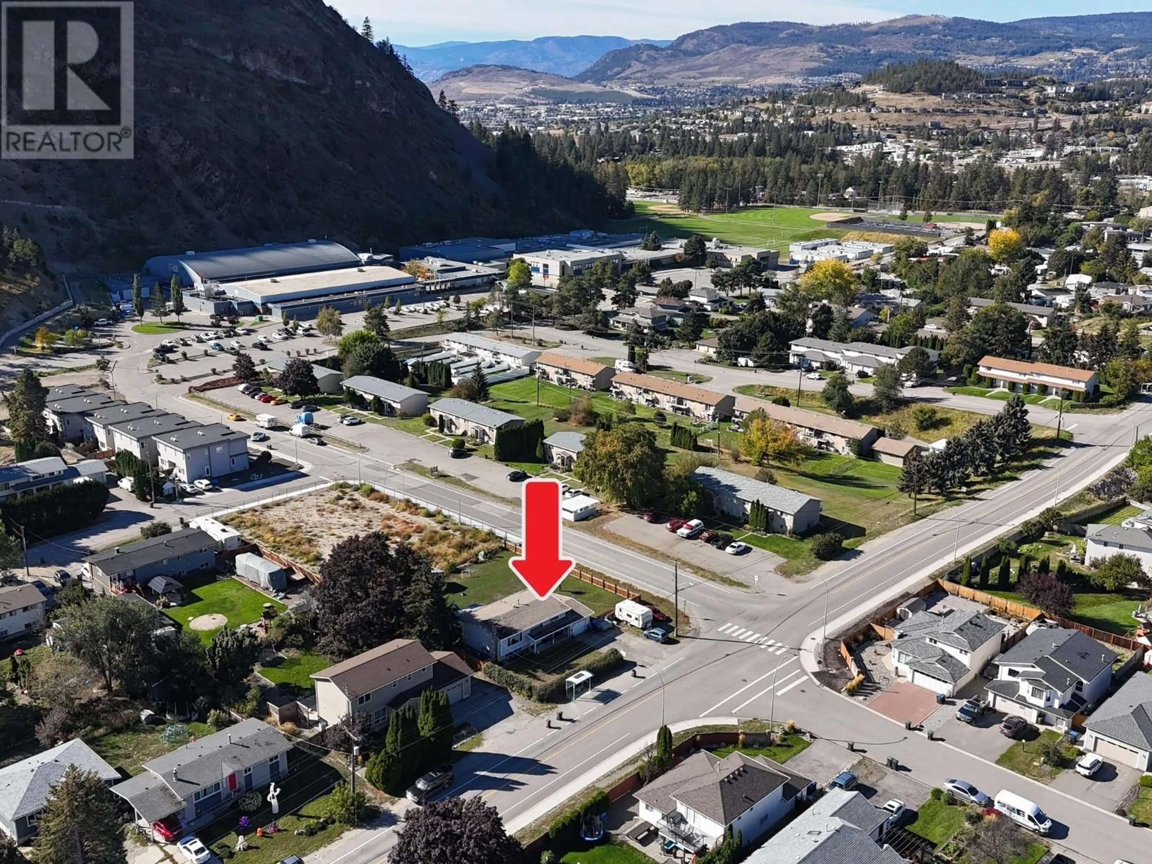 A pic from outside/outdoor area/front of a property/back of a property/a pic from drone, mountain view for 1571 Ross Road, West Kelowna British Columbia V1Z1L5