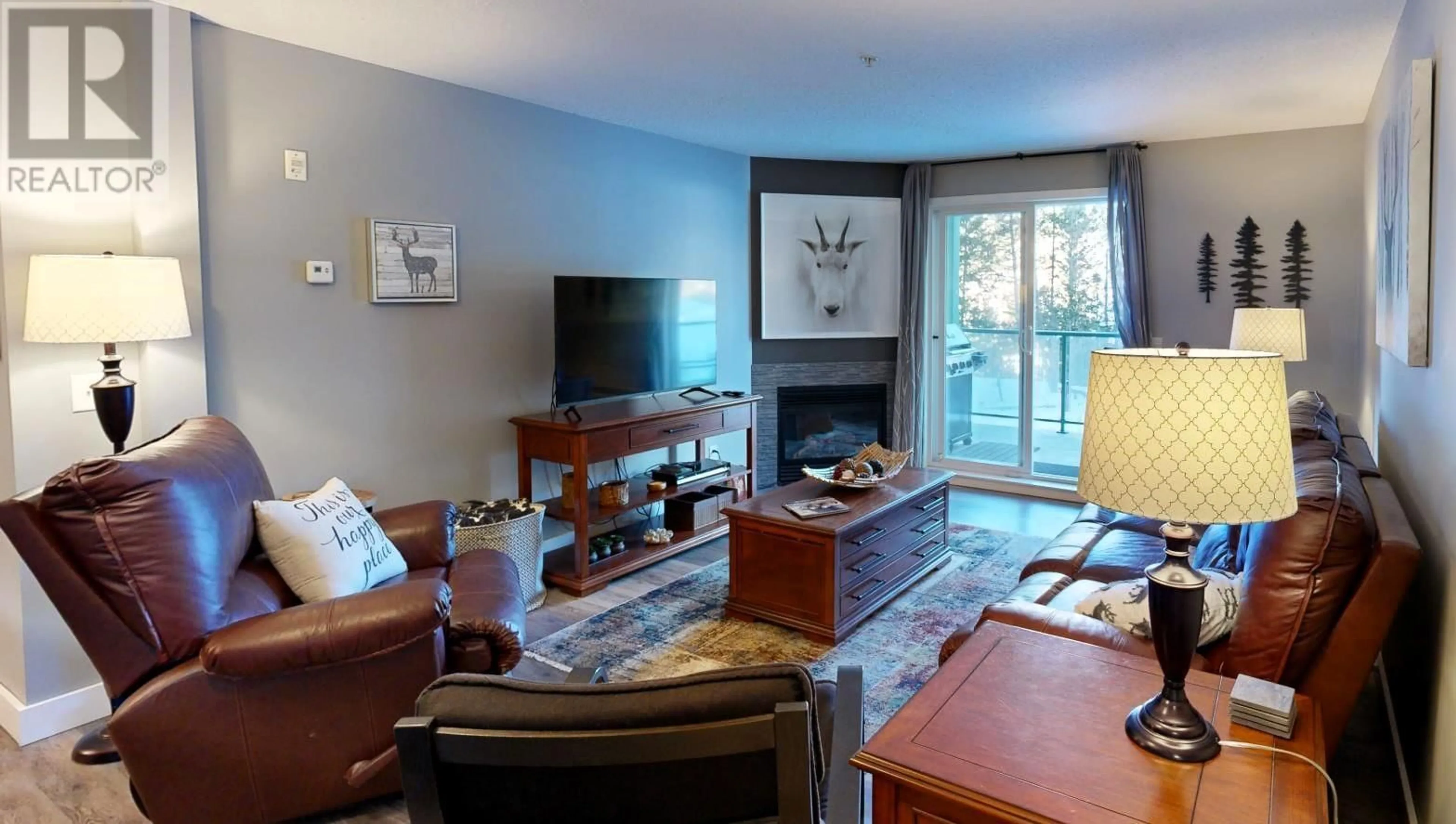 Living room with furniture, wood/laminate floor for 4765 FORSTERS LANDING Road Unit# 108, Radium Hot Springs British Columbia V0A1M0