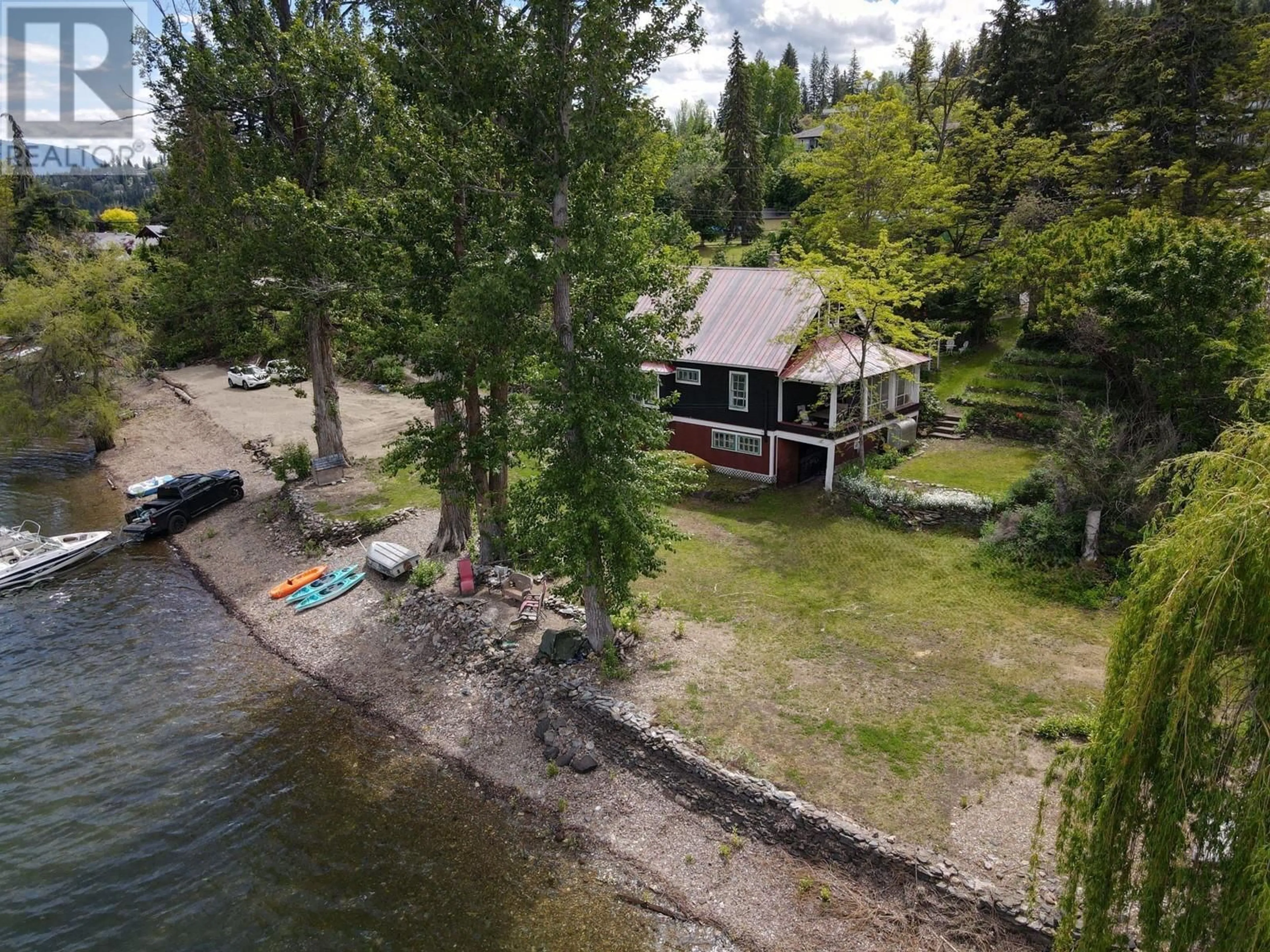 A pic from outside/outdoor area/front of a property/back of a property/a pic from drone, water/lake/river/ocean view for 2415 Blind Bay Road, Blind Bay British Columbia V0E1H2