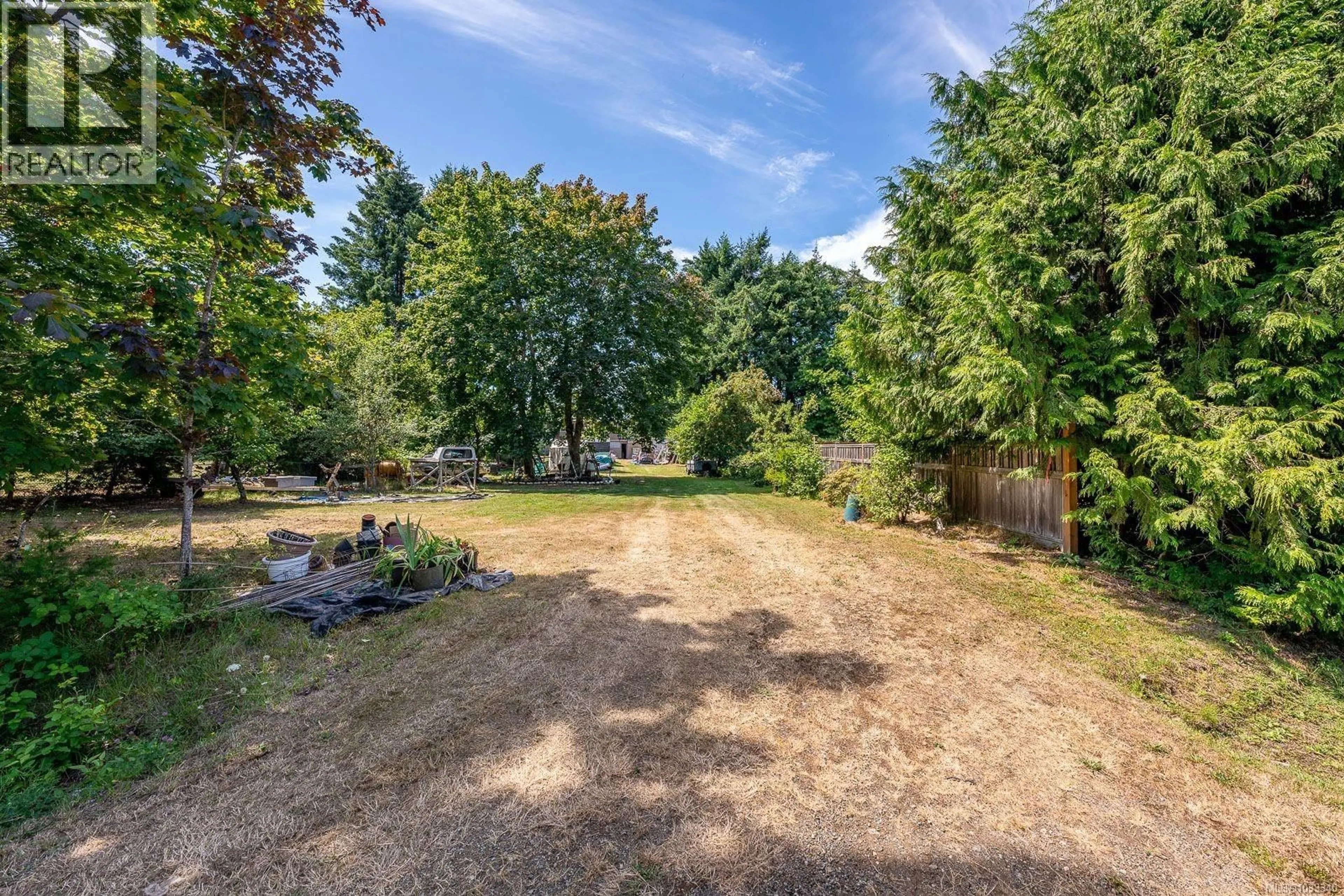 A pic from outside/outdoor area/front of a property/back of a property/a pic from drone, forest/trees view for 4732 OAKRIDGE DRIVE, Courtenay British Columbia V9N6A8