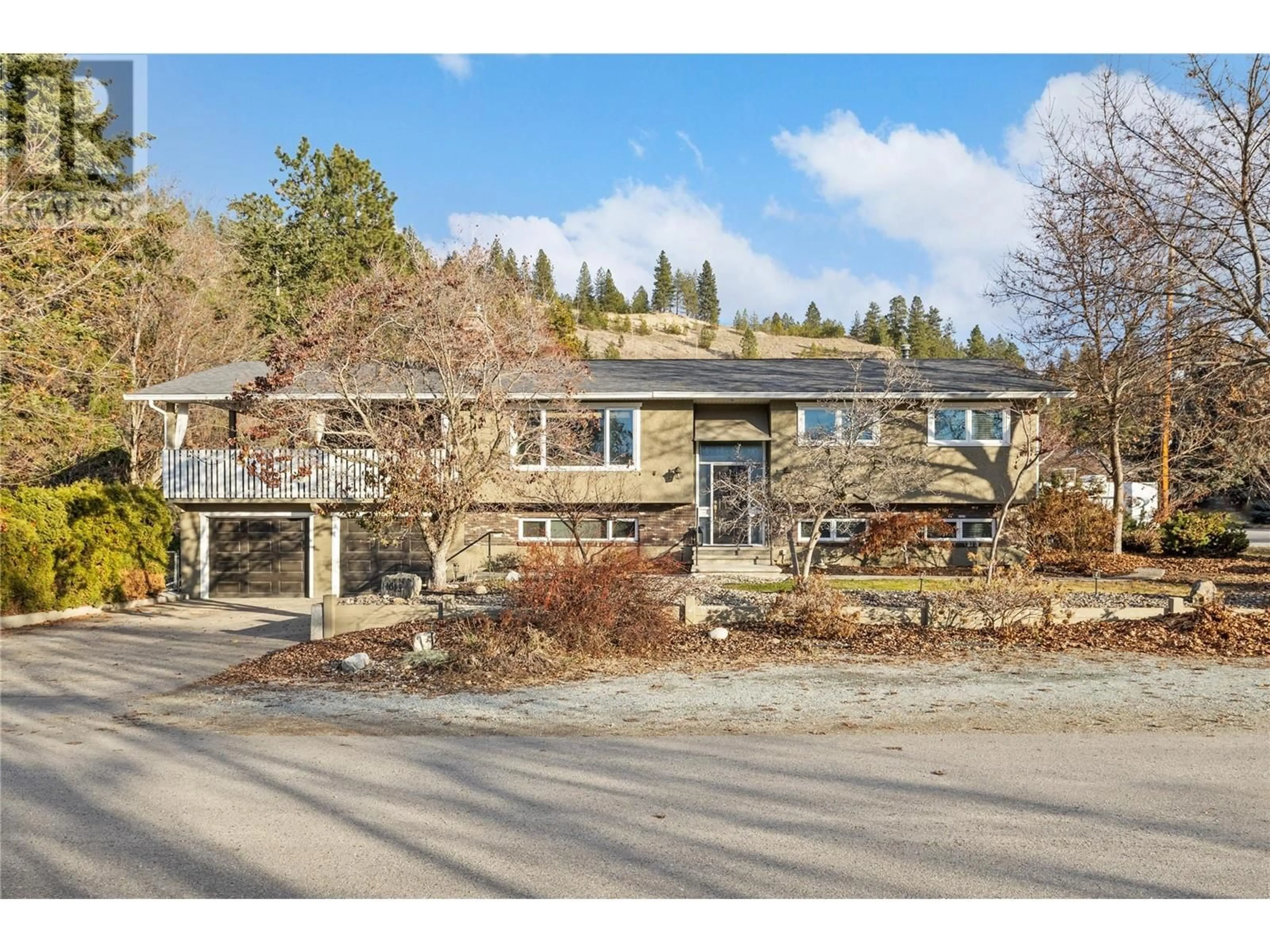 A pic from outside/outdoor area/front of a property/back of a property/a pic from drone, street for 4645 Barton Street, Kelowna British Columbia V1W2B4