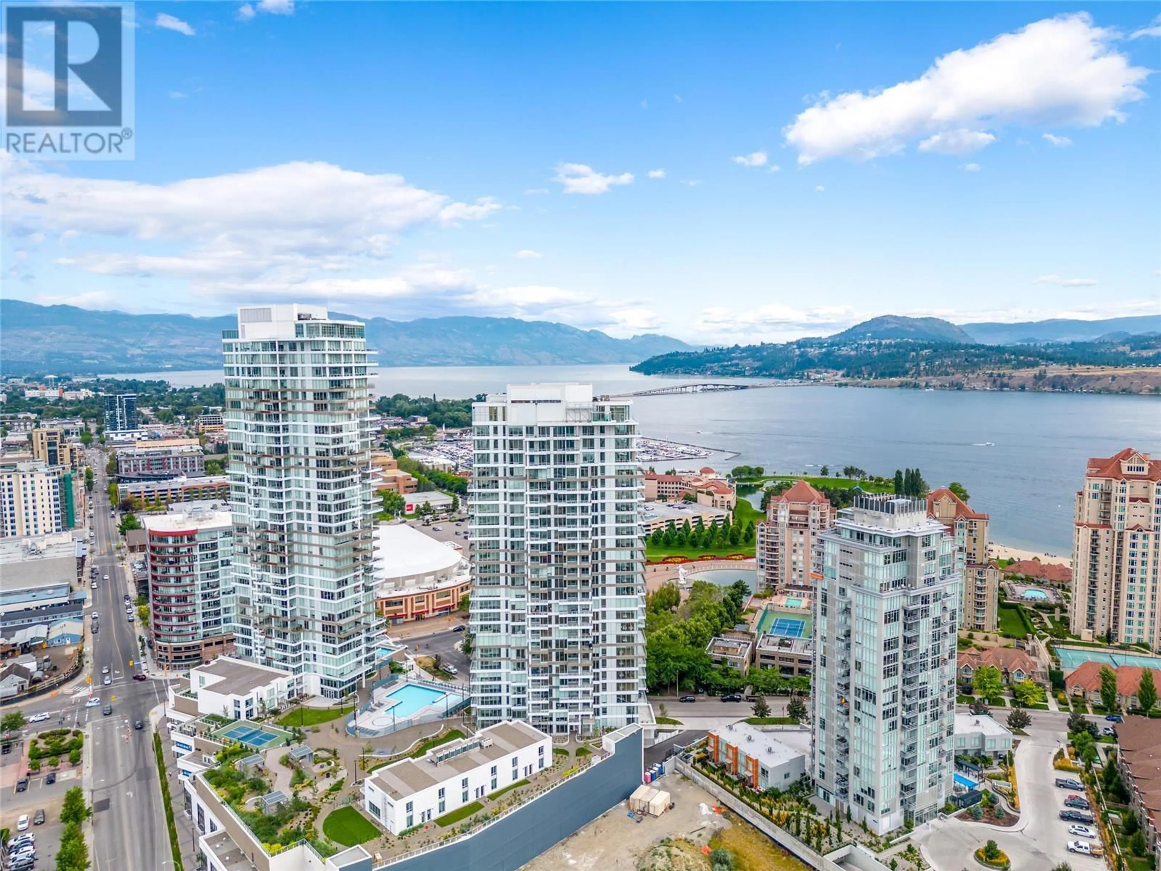 A pic from outside/outdoor area/front of a property/back of a property/a pic from drone, water/lake/river/ocean view for 609 - 1191 SUNSET DRIVE, Kelowna British Columbia V1Y0J4