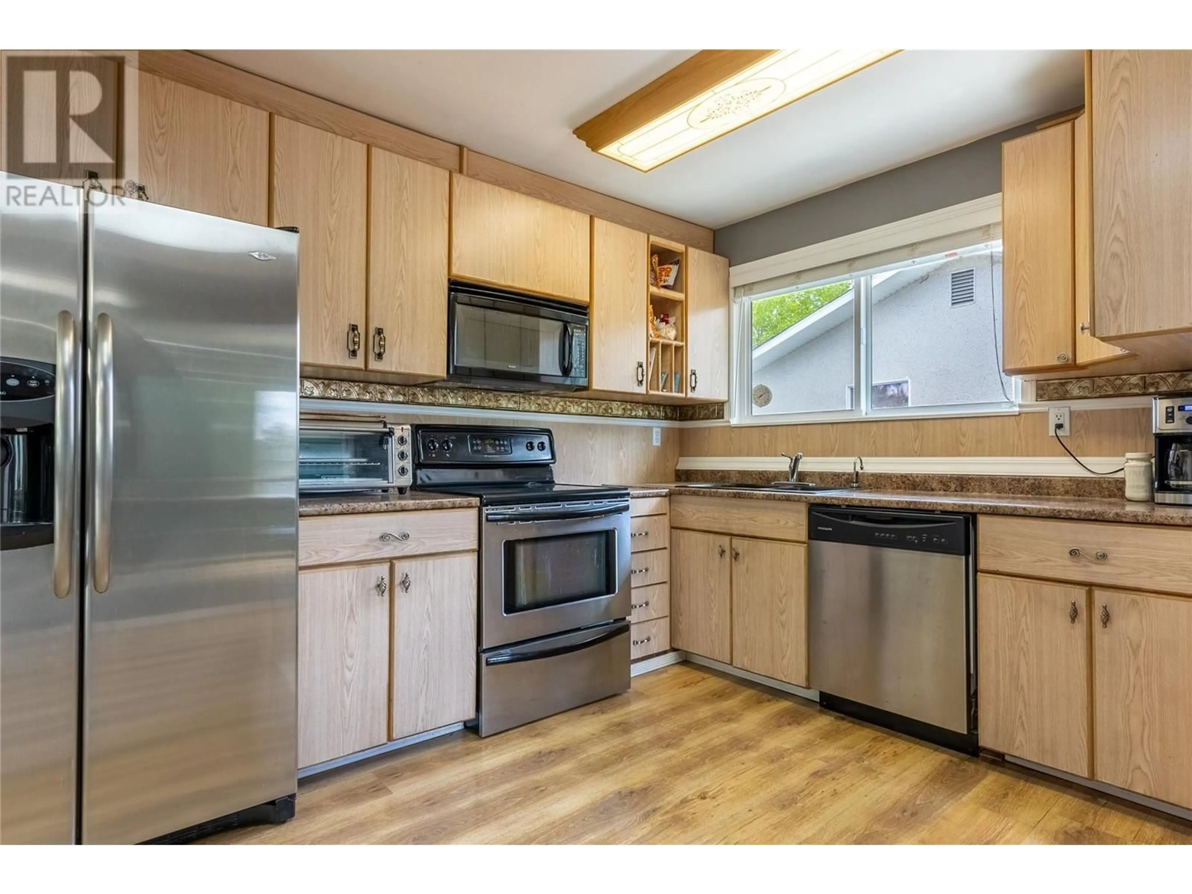 Standard kitchen, wood/laminate floor for 21 GALENA Avenue, Logan Lake British Columbia V0K1W0