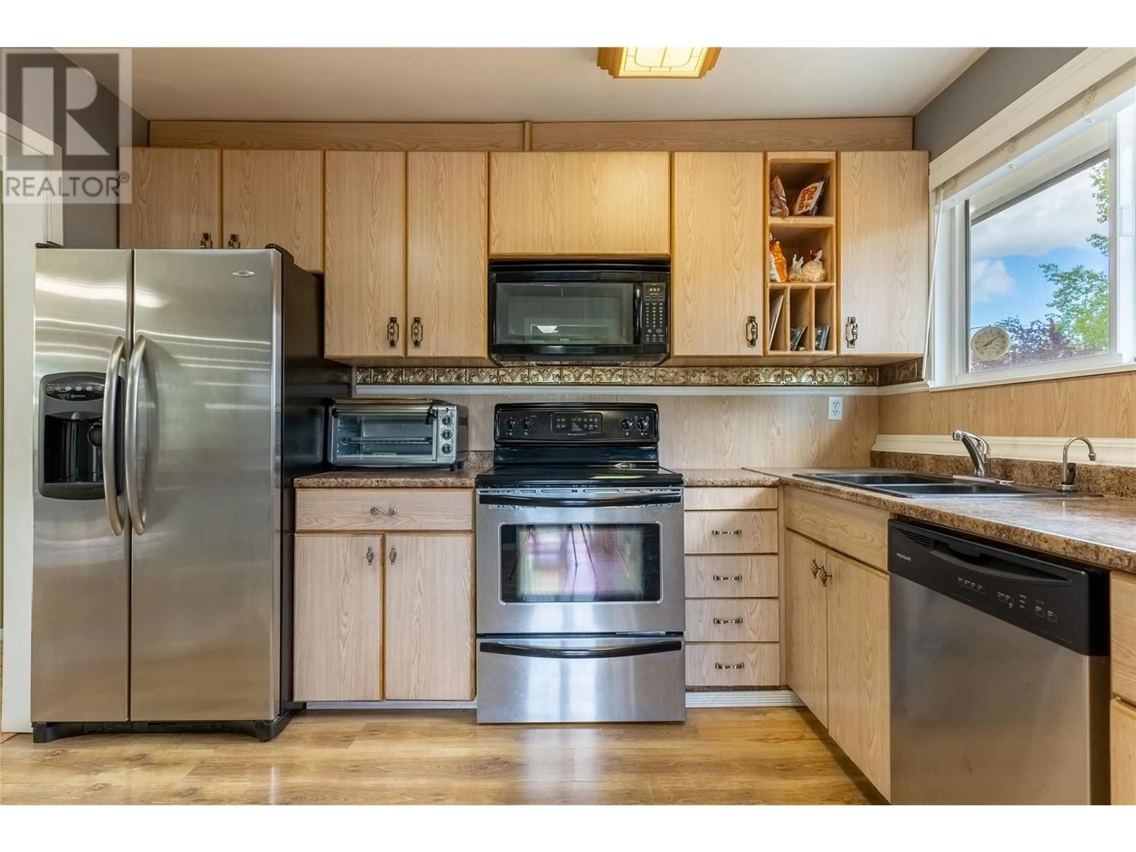 Standard kitchen, wood/laminate floor for 21 GALENA Avenue, Logan Lake British Columbia V0K1W0