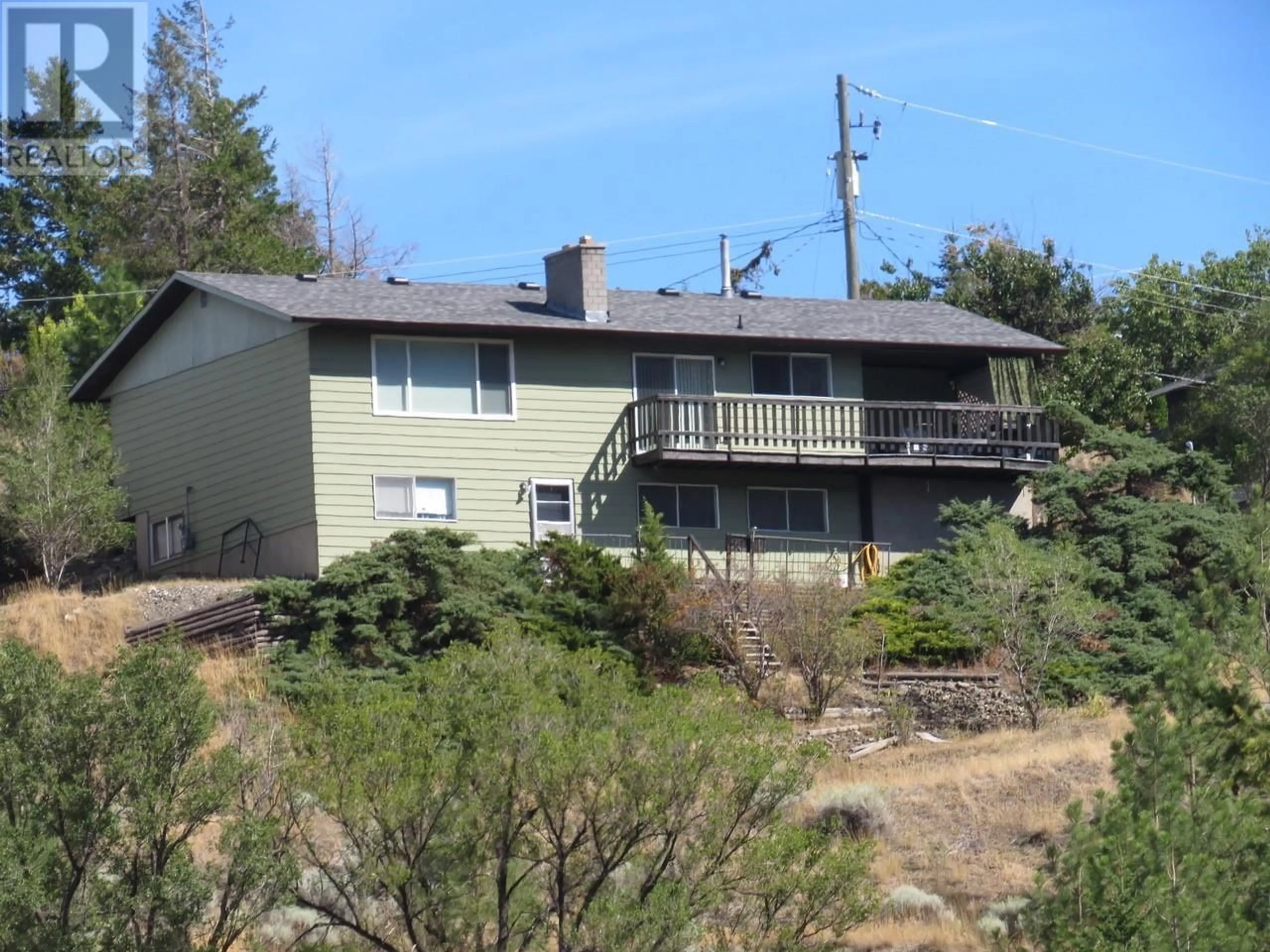 A pic from outside/outdoor area/front of a property/back of a property/a pic from drone, mountain view for 1249 HIGHRIDGE Drive, Kamloops British Columbia V2C5S5