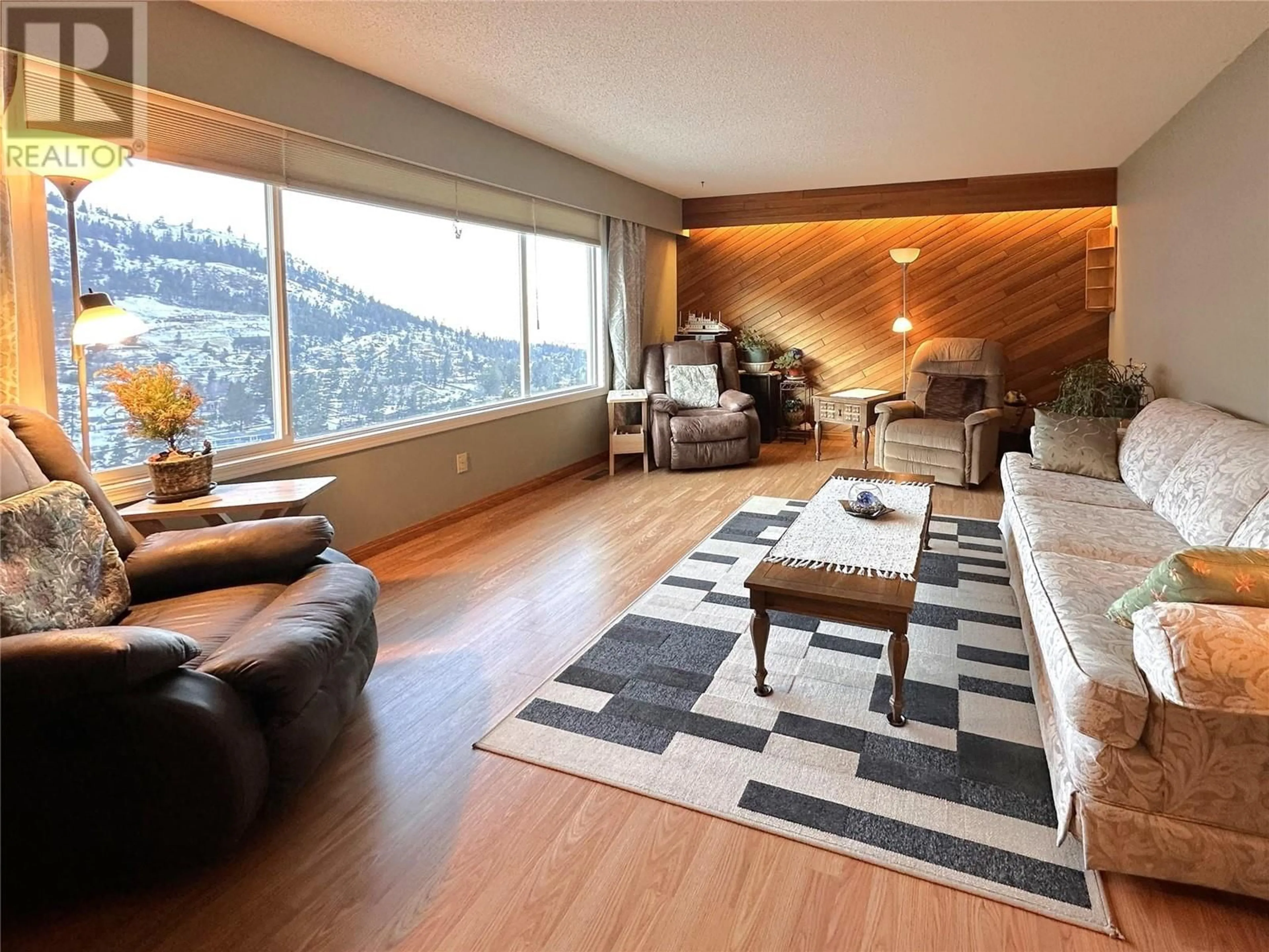 Living room with furniture, wood/laminate floor for 1249 HIGHRIDGE Drive, Kamloops British Columbia V2C5S5