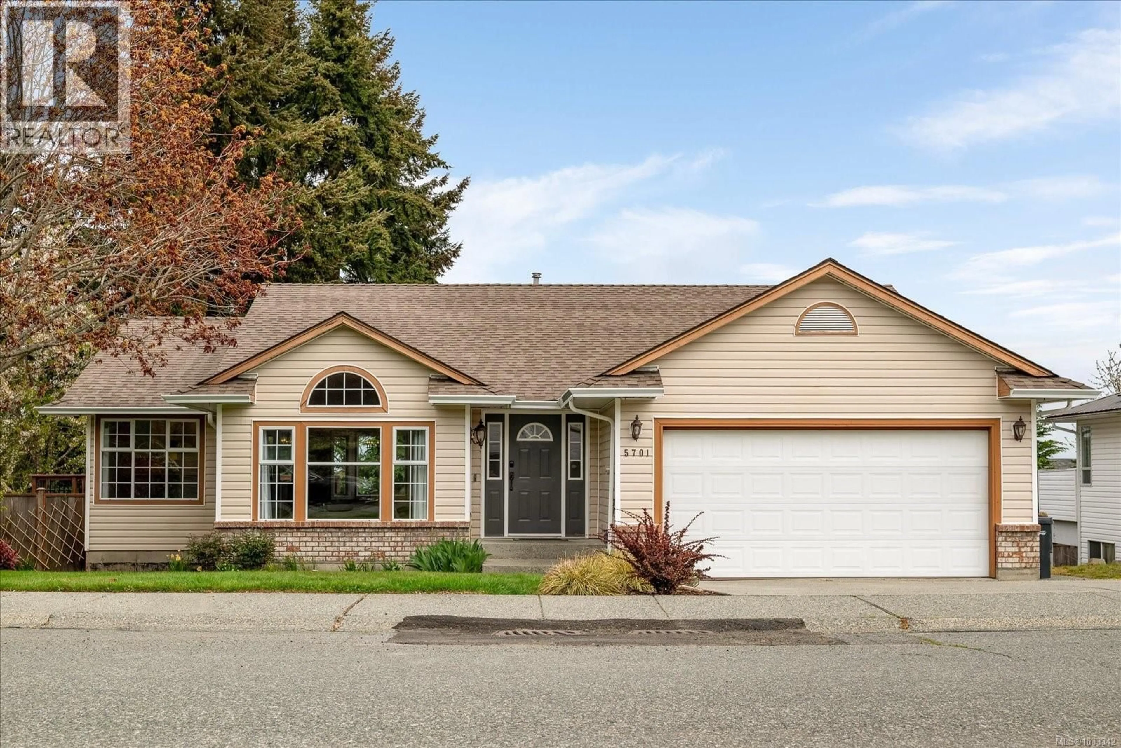 Home with vinyl exterior material, street for 5701 MALIBU TERRACE, Nanaimo British Columbia V9T5W7