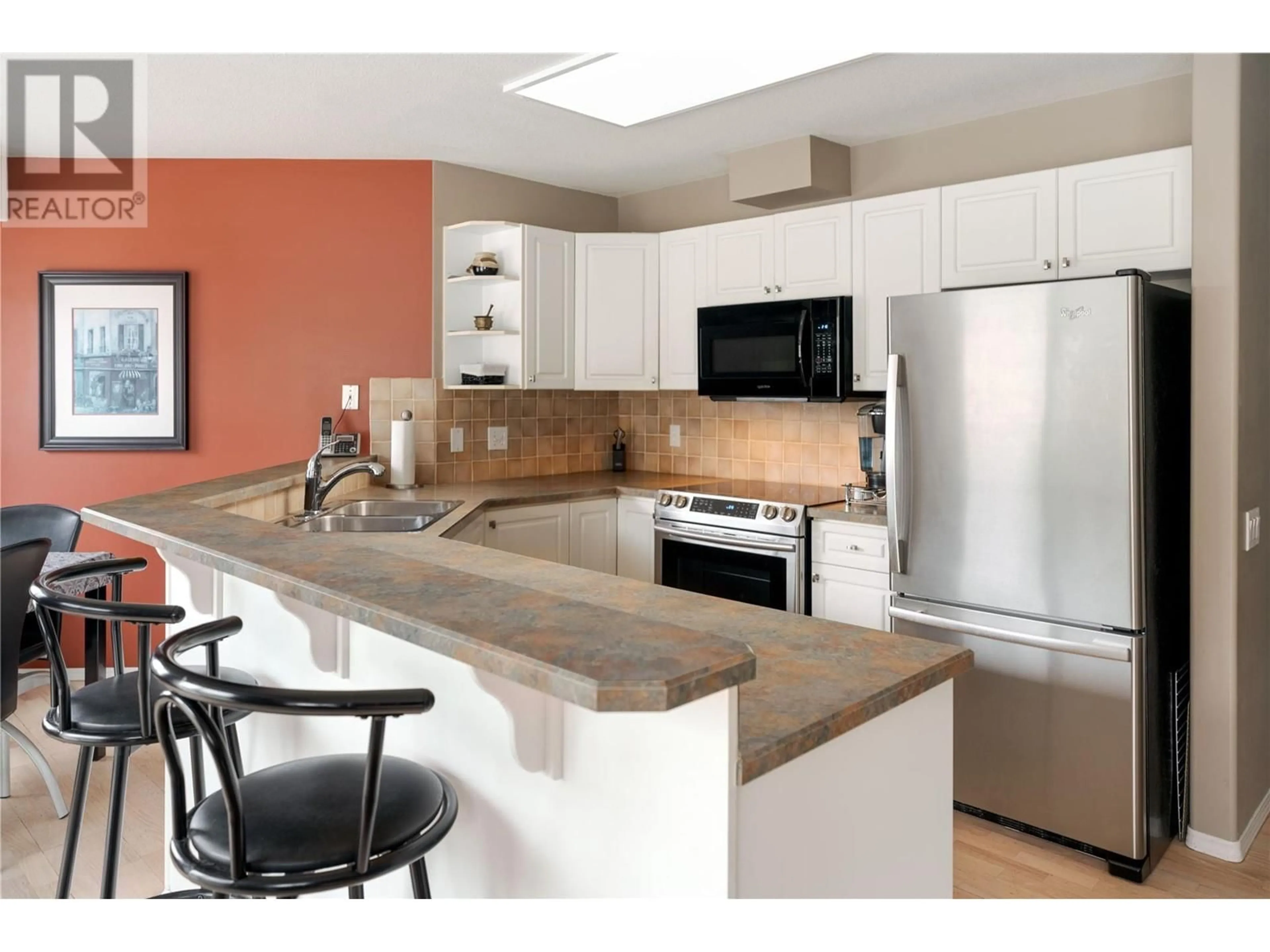 Open concept kitchen, ceramic/tile floor for 980 Dilworth Drive Unit# 115, Kelowna British Columbia V1V1S6