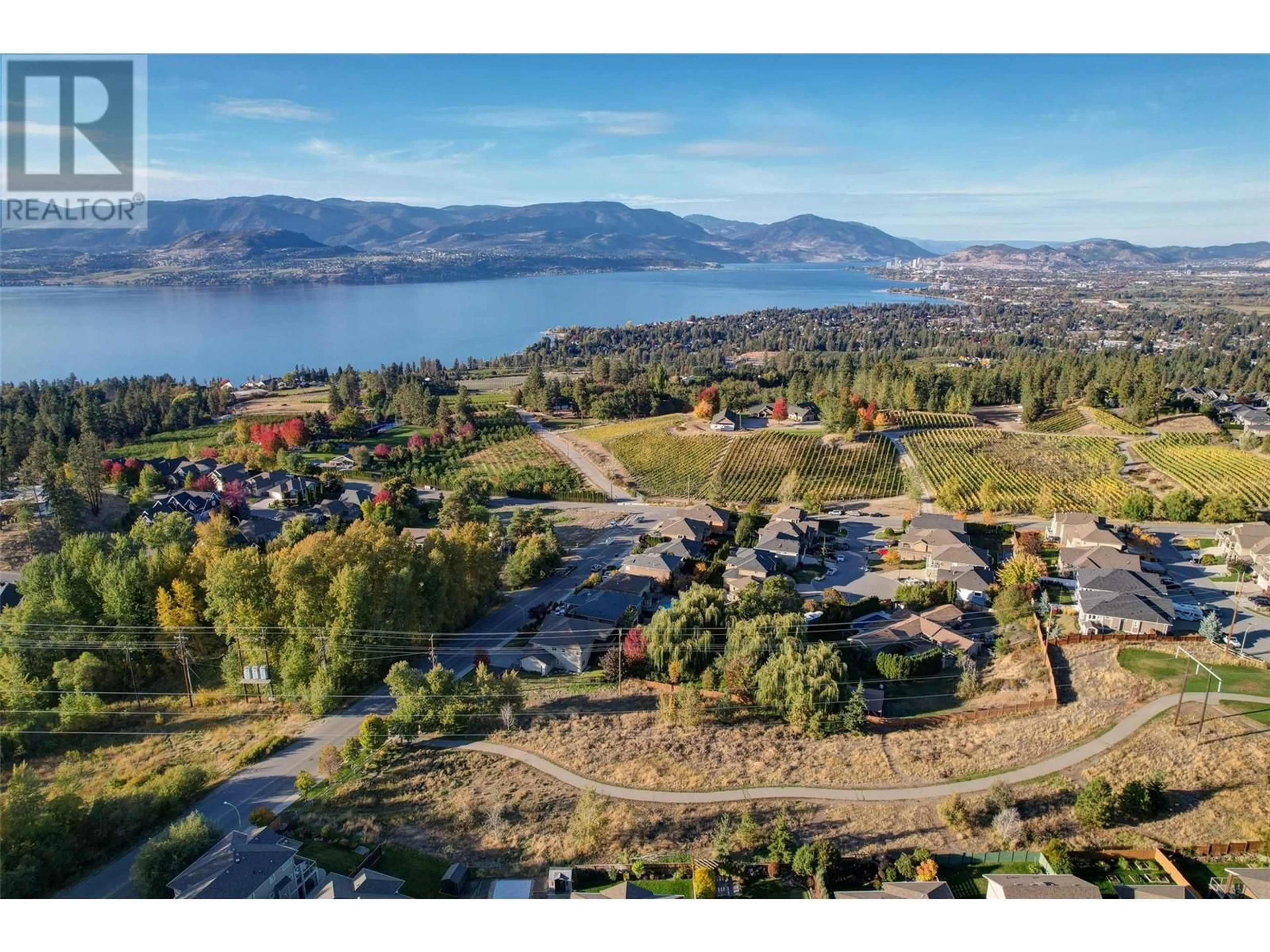 A pic from outside/outdoor area/front of a property/back of a property/a pic from drone, water/lake/river/ocean view for 5025 Killdeer Road, Kelowna British Columbia V1W4M4