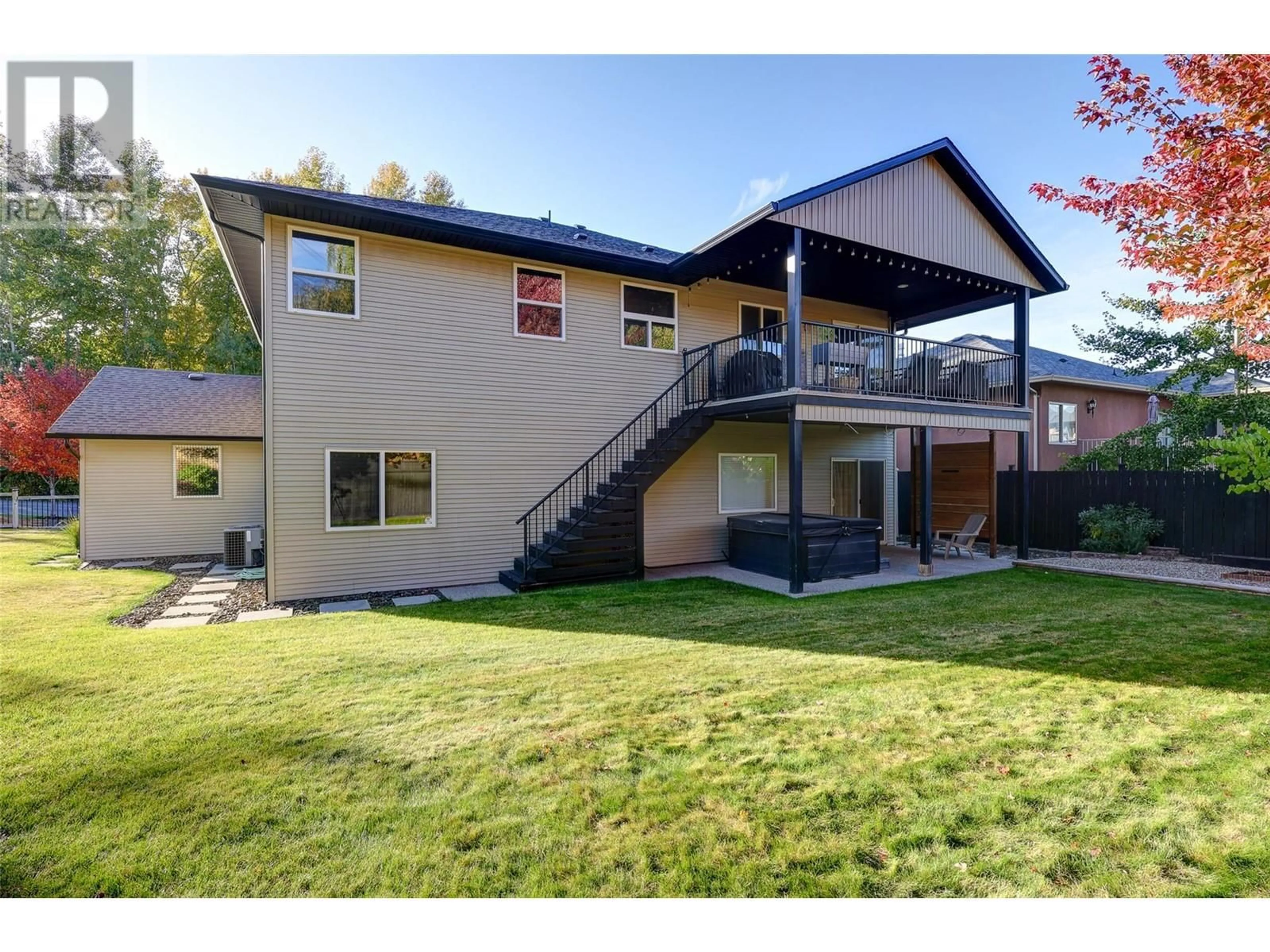 Home with vinyl exterior material, unknown for 5025 Killdeer Road, Kelowna British Columbia V1W4M4