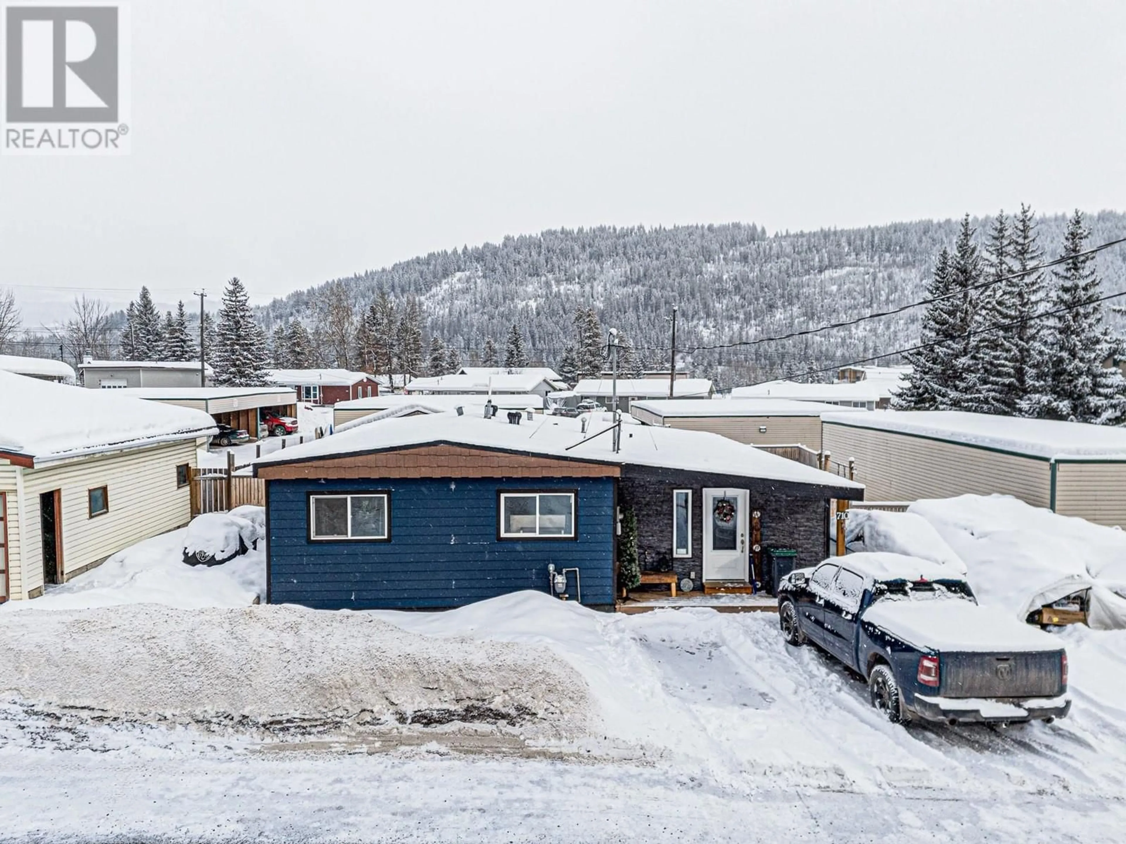 A pic from outside/outdoor area/front of a property/back of a property/a pic from drone, mountain view for 710 FORDING Drive, Elkford British Columbia V0B1H0