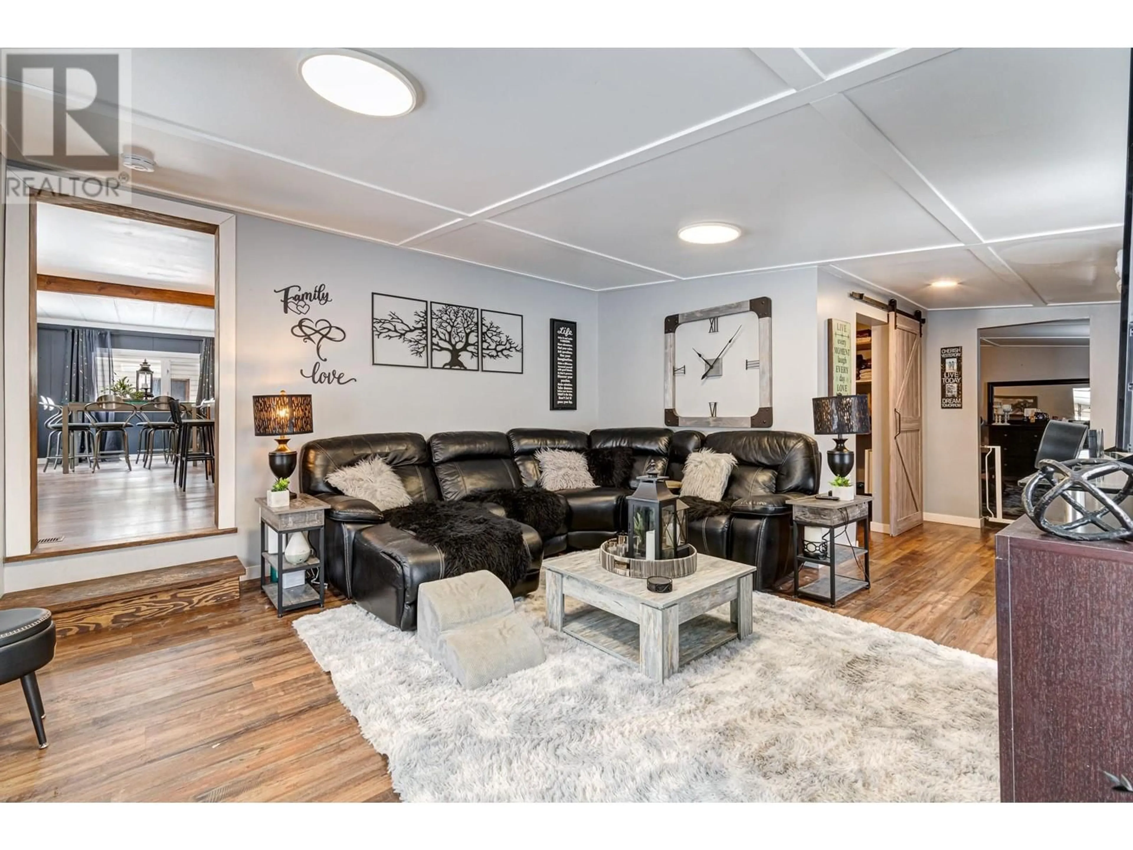 Living room with furniture, wood/laminate floor for 710 FORDING Drive, Elkford British Columbia V0B1H0