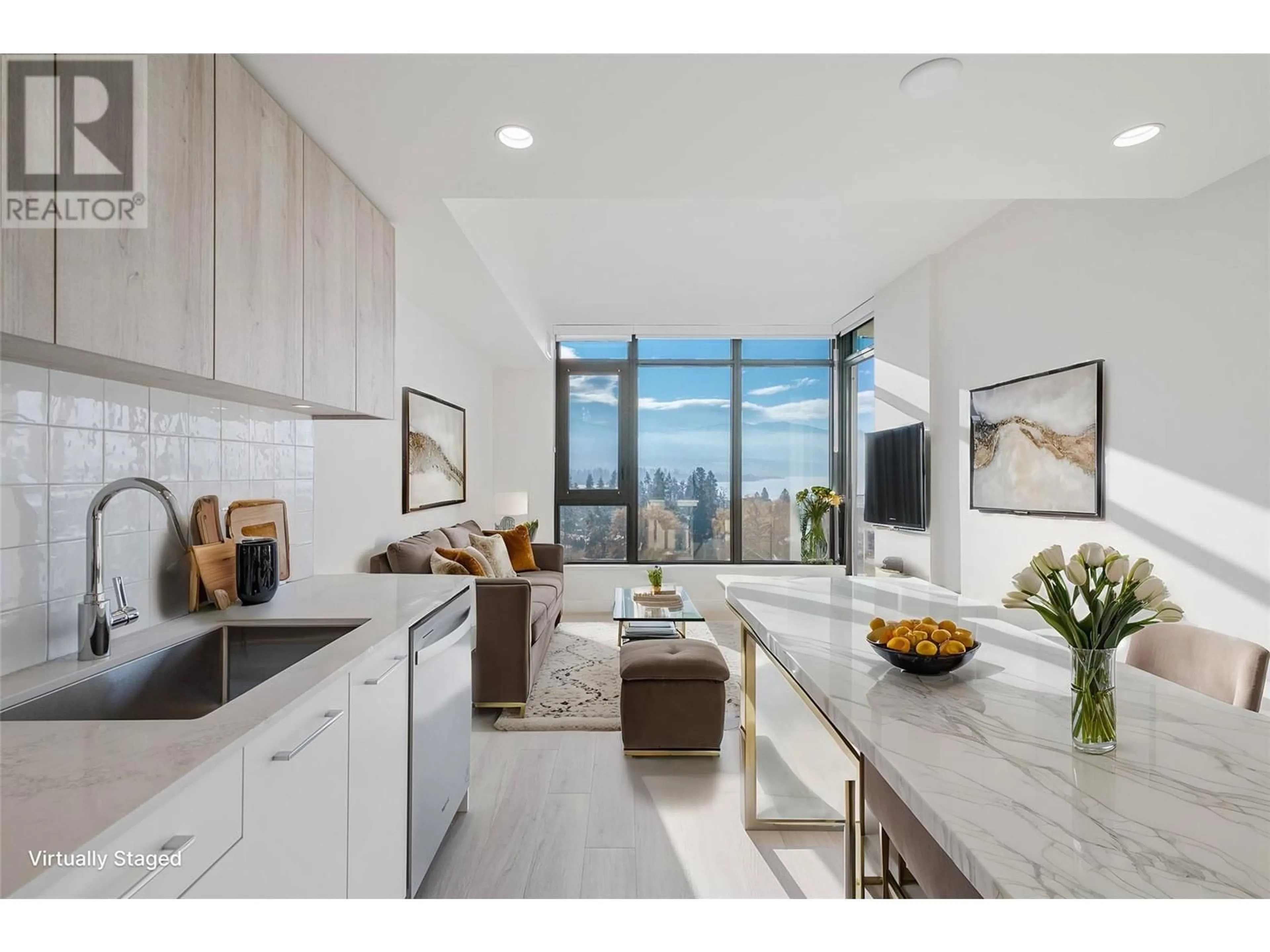Open concept kitchen, ceramic/tile floor for 907 - 3699 CAPOZZI ROAD, Kelowna British Columbia V1W0G3