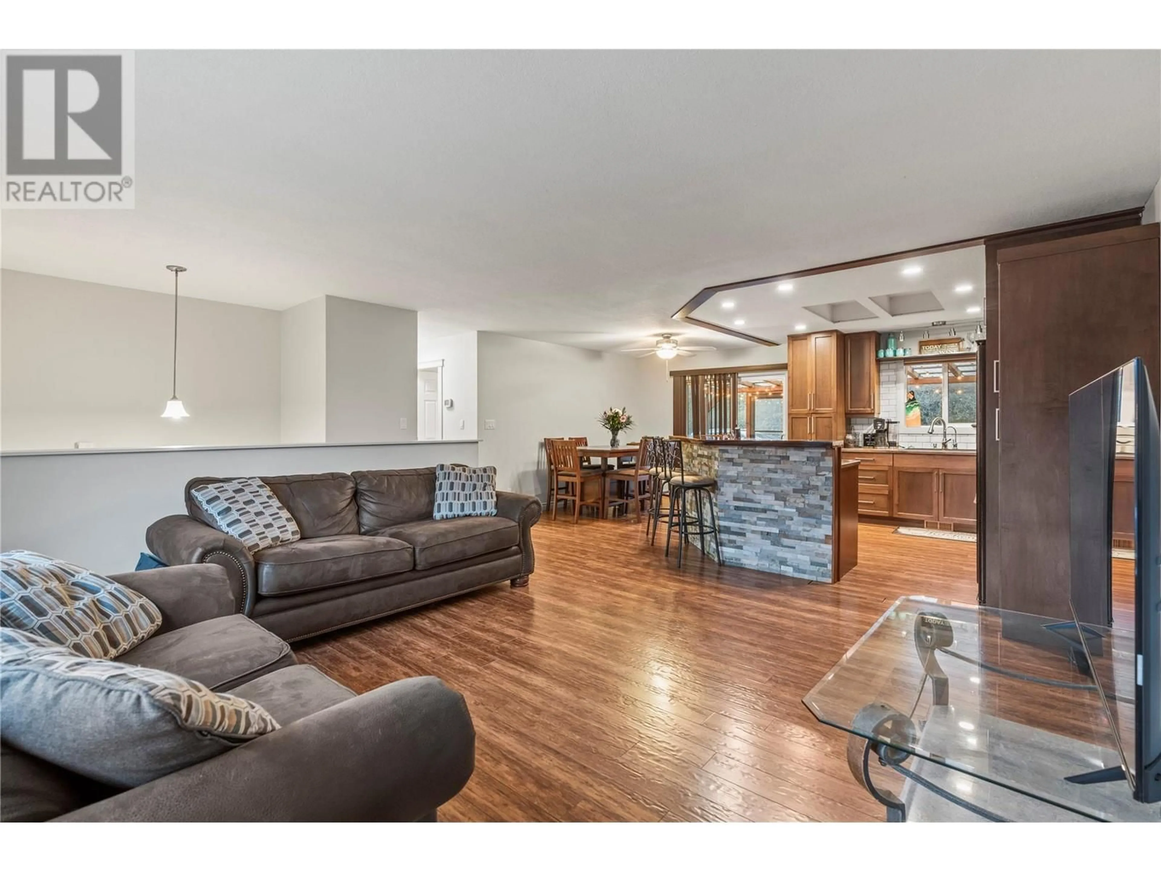 Open concept kitchen, wood/laminate floor for 1718 GRANDVIEW AVENUE, Lumby British Columbia V0E2G0