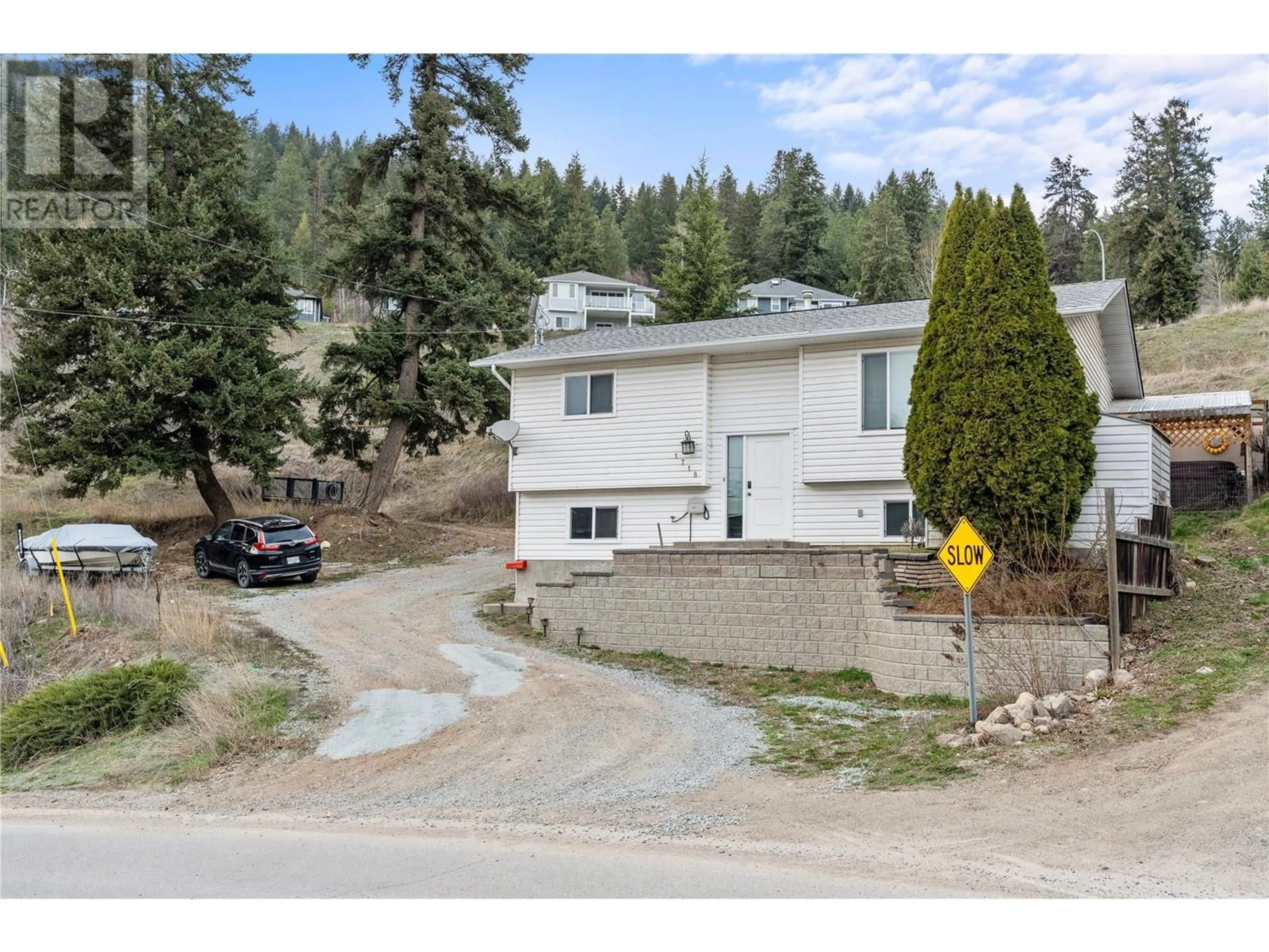 A pic from outside/outdoor area/front of a property/back of a property/a pic from drone, street for 1718 Grandview Avenue, Lumby British Columbia V0E2G0