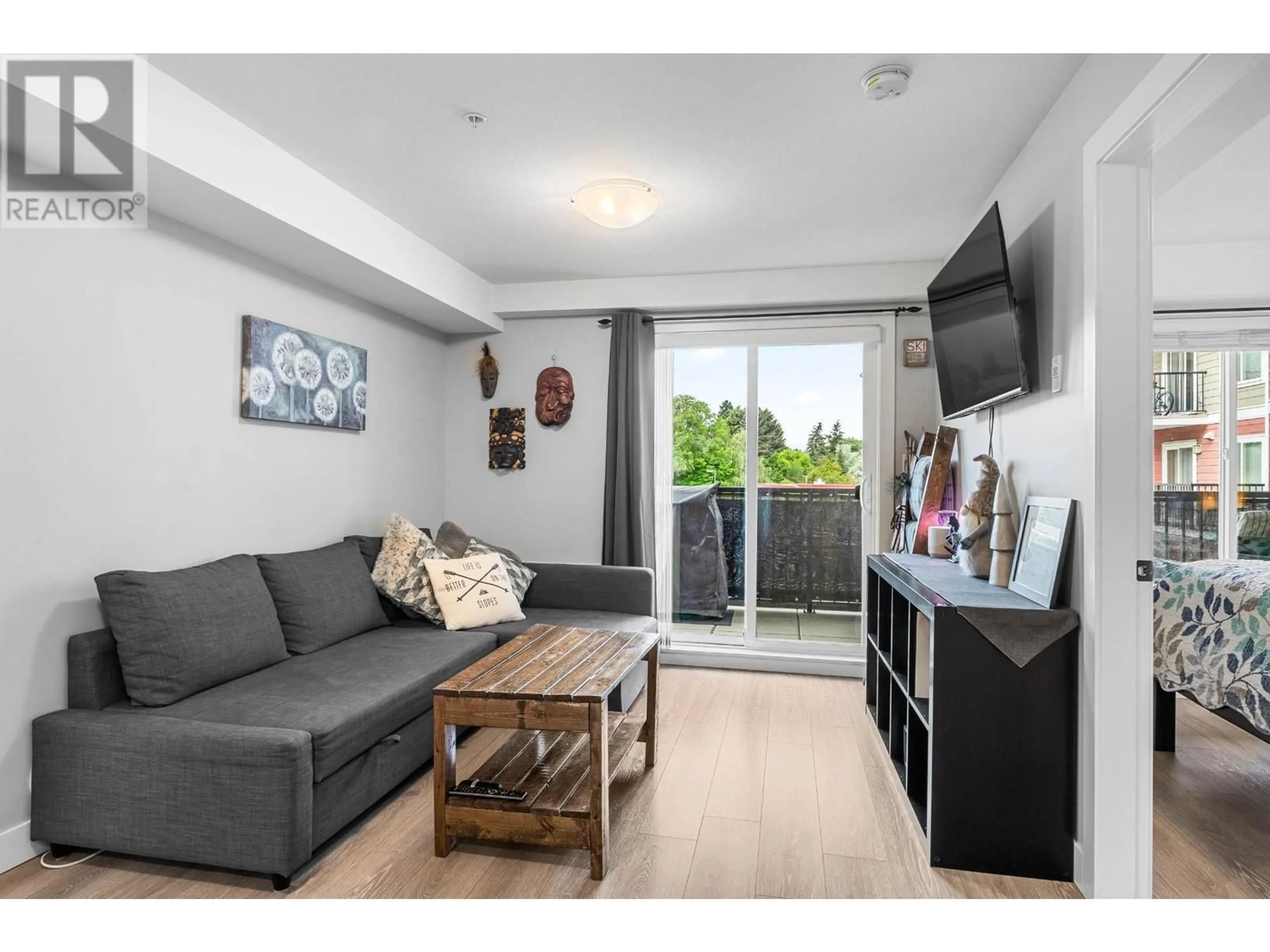 Living room with furniture, wood/laminate floor for 5170 DALLAS Drive Unit# 200, Kamloops British Columbia V2H1T7