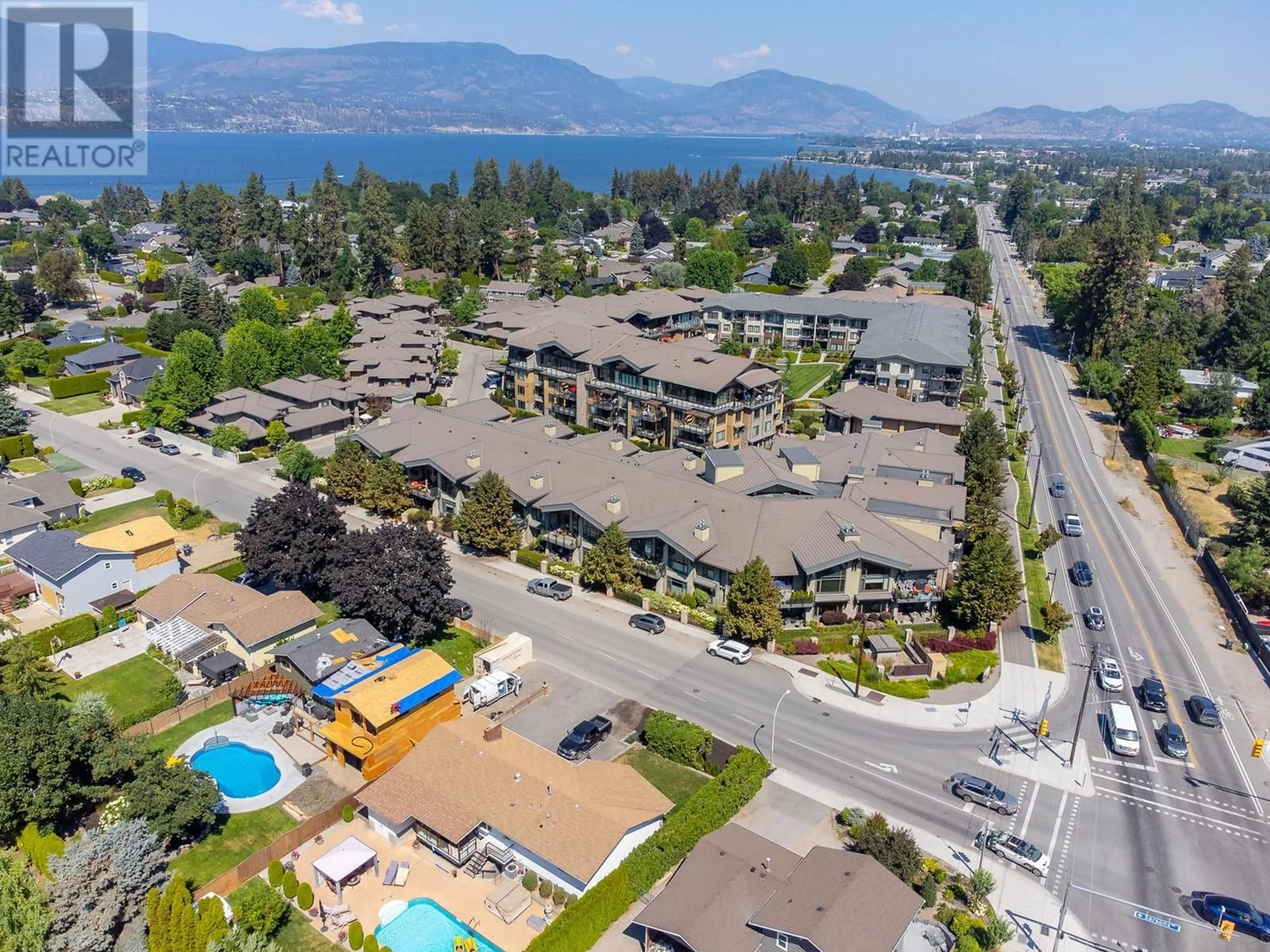 A pic from outside/outdoor area/front of a property/back of a property/a pic from drone, mountain view for 600 Sarsons Road Unit# 101, Kelowna British Columbia V1W5H5