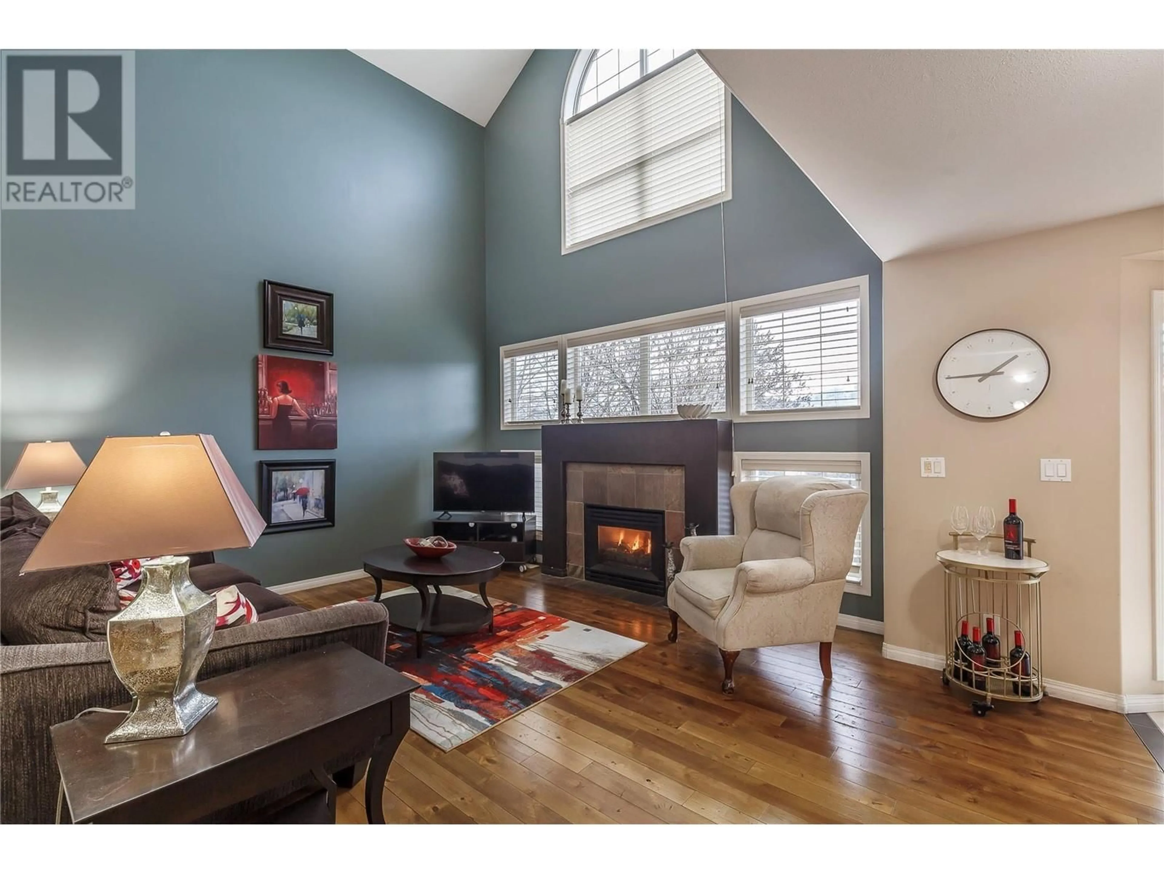 Living room with furniture, wood/laminate floor for 5501 20 Street Unit# 142, Vernon British Columbia V1T7T2