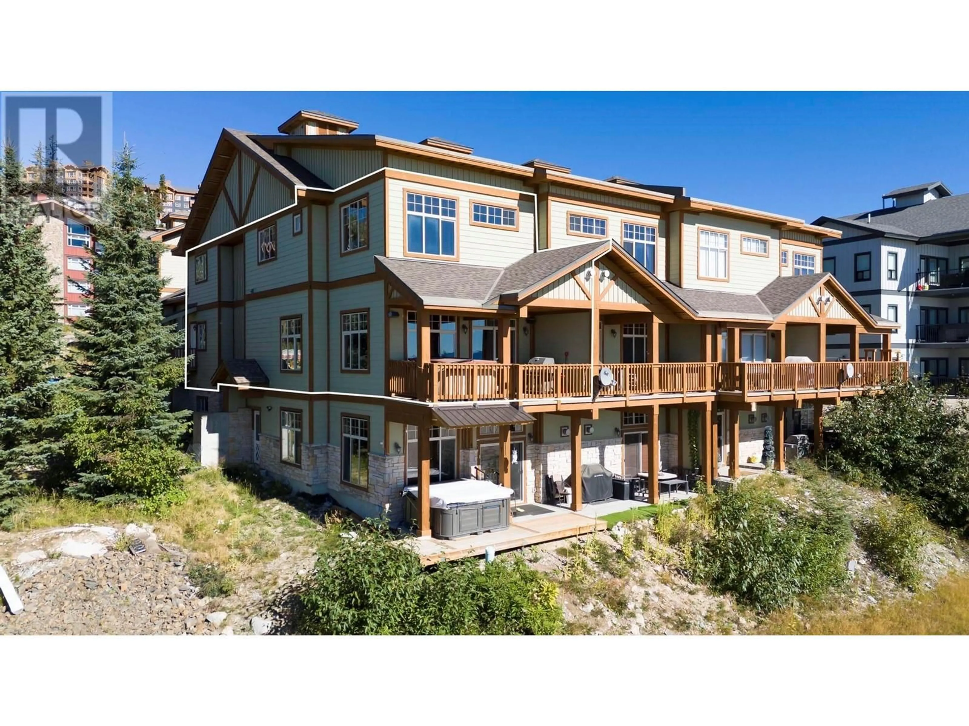 A pic from outside/outdoor area/front of a property/back of a property/a pic from drone, unknown for 2 - 5045 SNOWBIRD WAY, Big White British Columbia V1P1P3