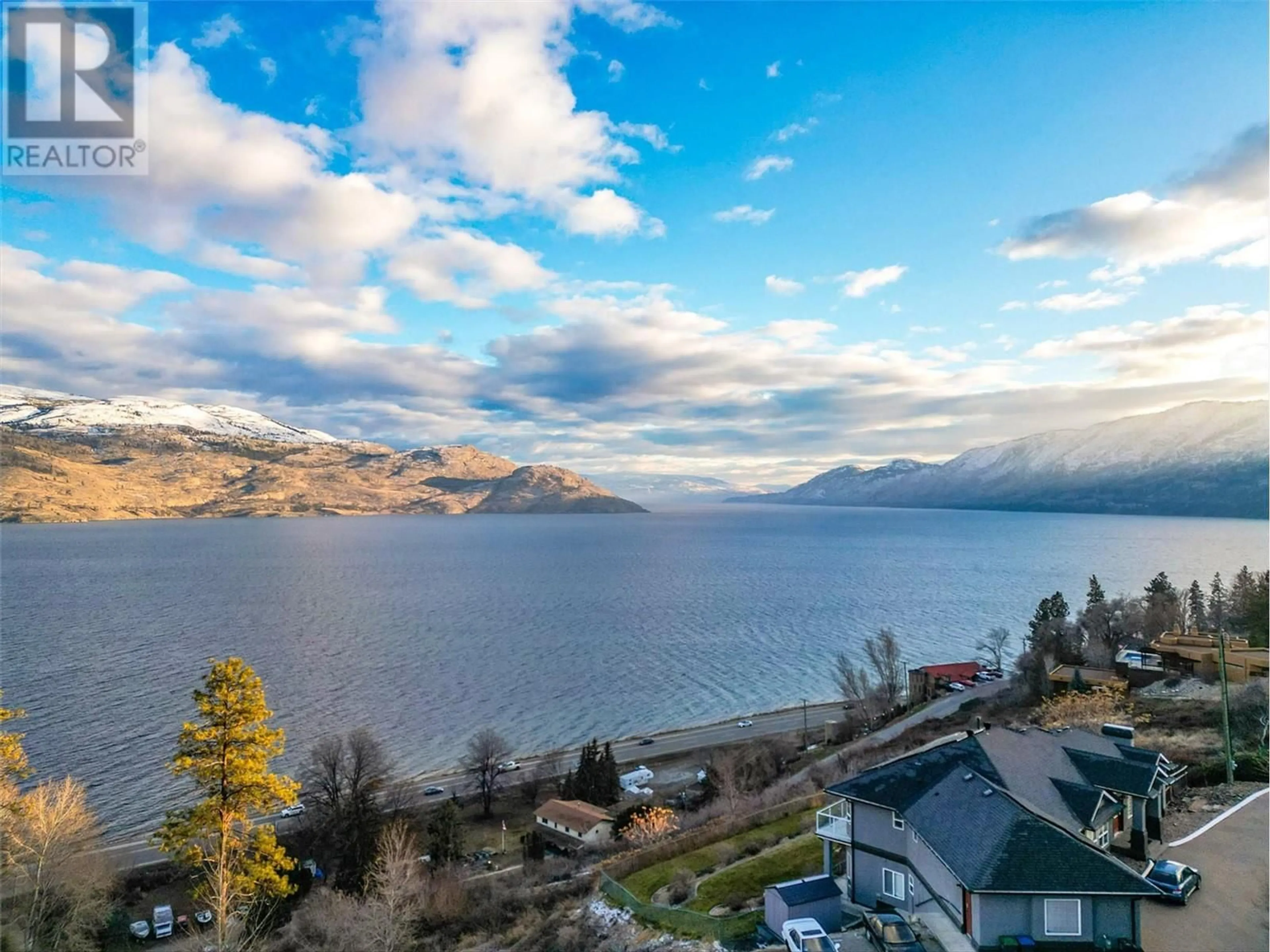 A pic from outside/outdoor area/front of a property/back of a property/a pic from drone, water/lake/river/ocean view for 6178 Lipsett Avenue, Peachland British Columbia V0H1X7