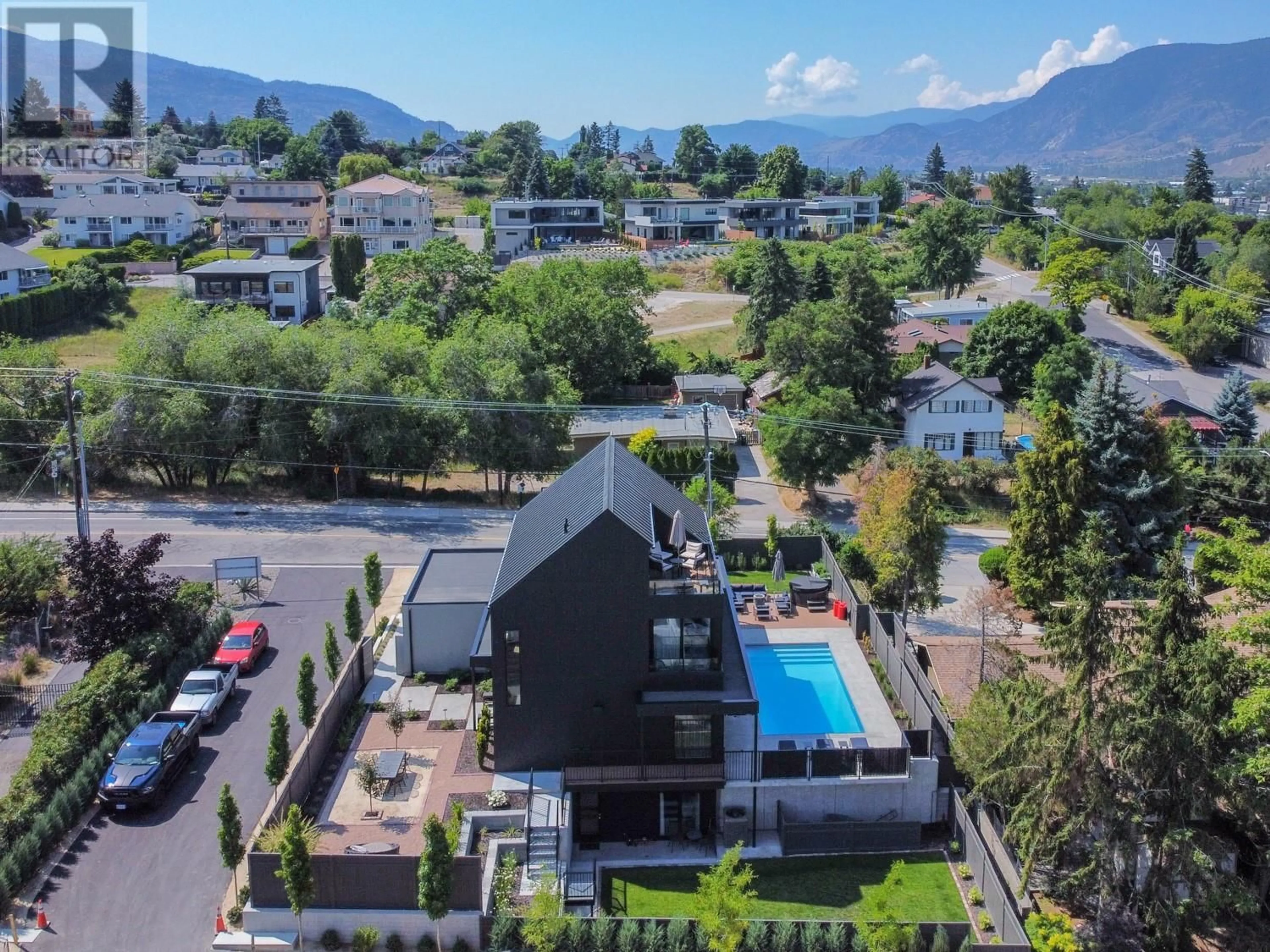 A pic from outside/outdoor area/front of a property/back of a property/a pic from drone, mountain view for 681 Vancouver Avenue, Penticton British Columbia V2A1A4