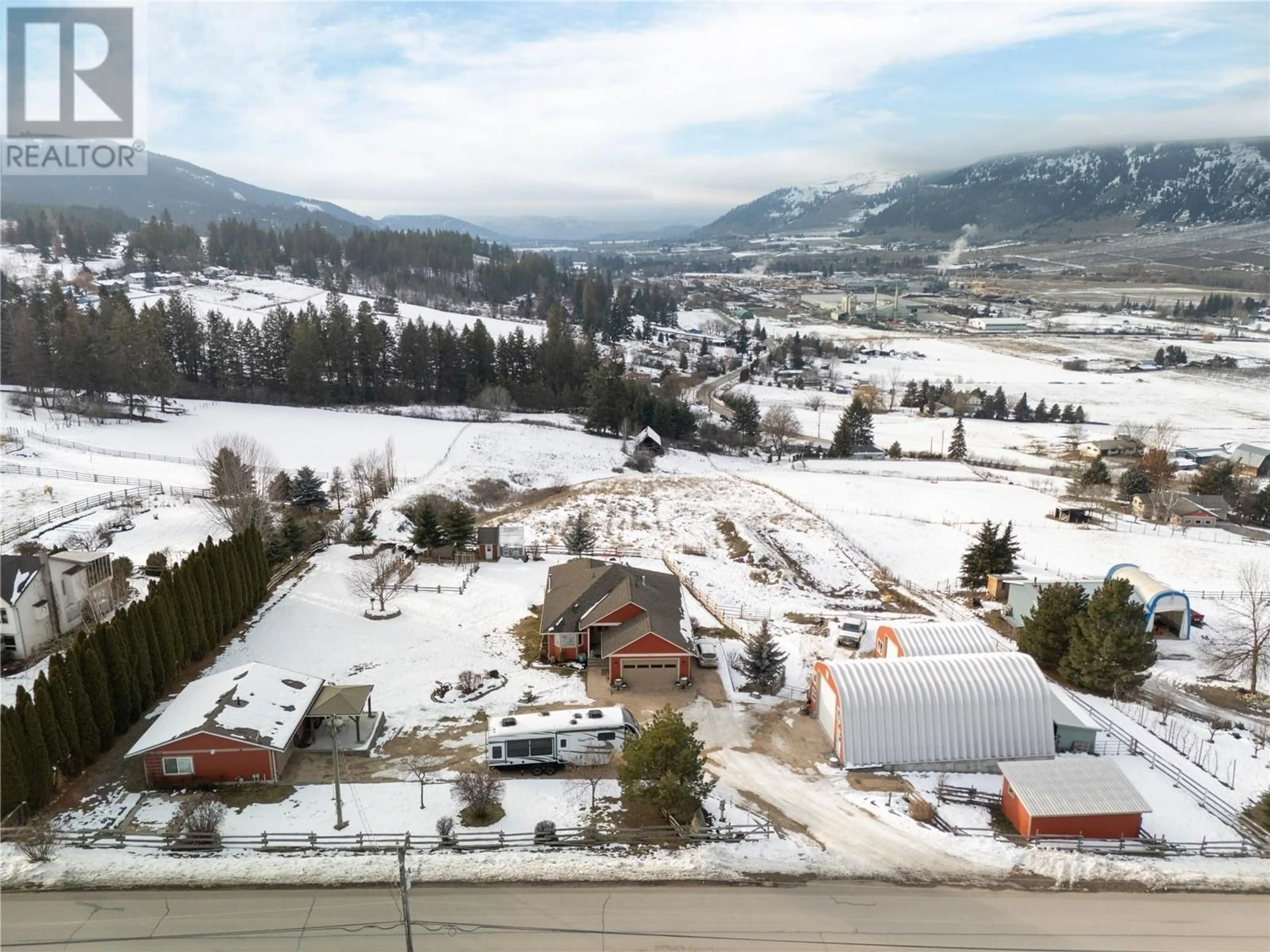 A pic from outside/outdoor area/front of a property/back of a property/a pic from drone, mountain view for 5380 Learmouth Road, Lavington British Columbia V1B3E8