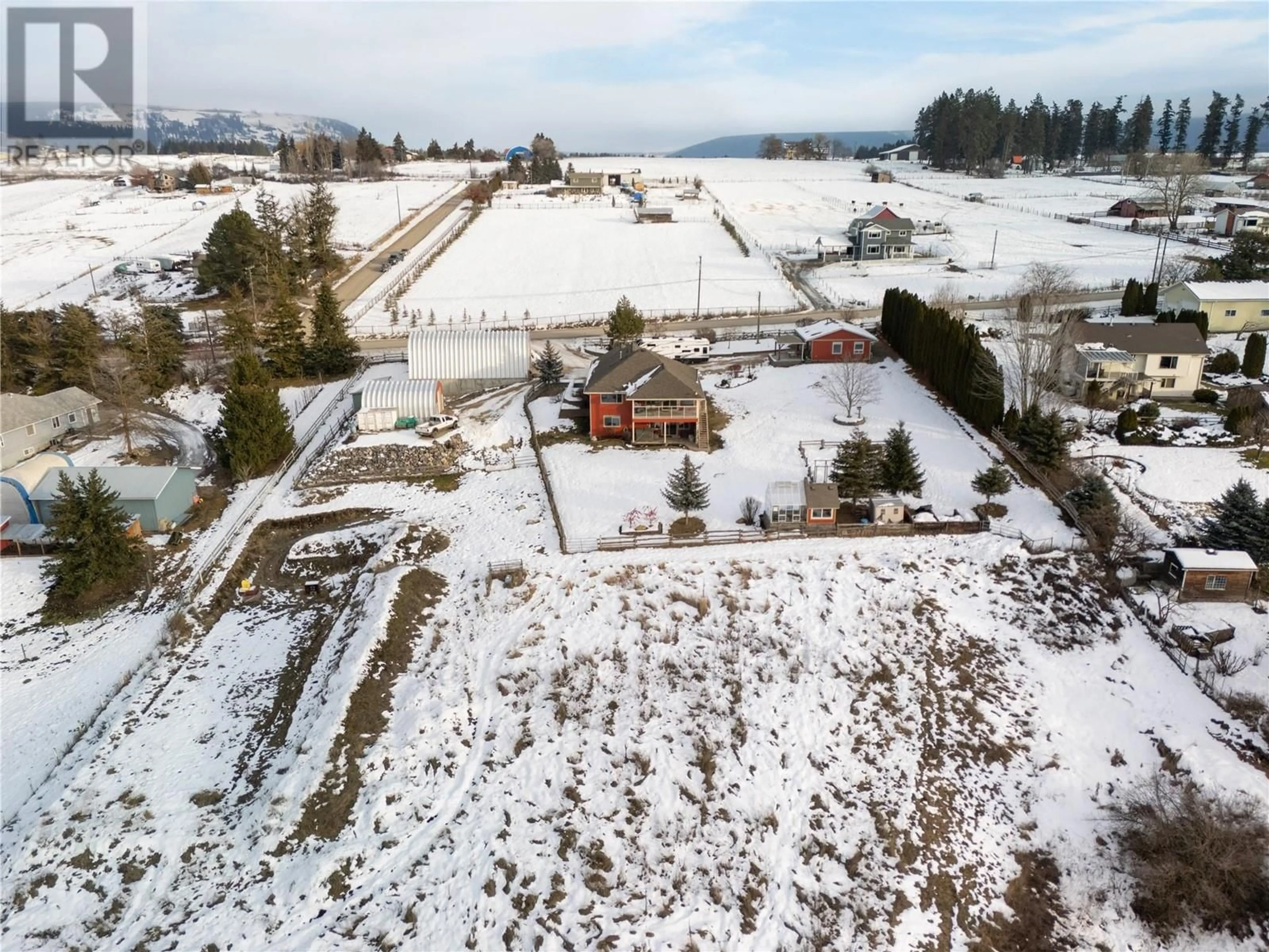 A pic from outside/outdoor area/front of a property/back of a property/a pic from drone, building for 5380 Learmouth Road, Lavington British Columbia V1B3E8