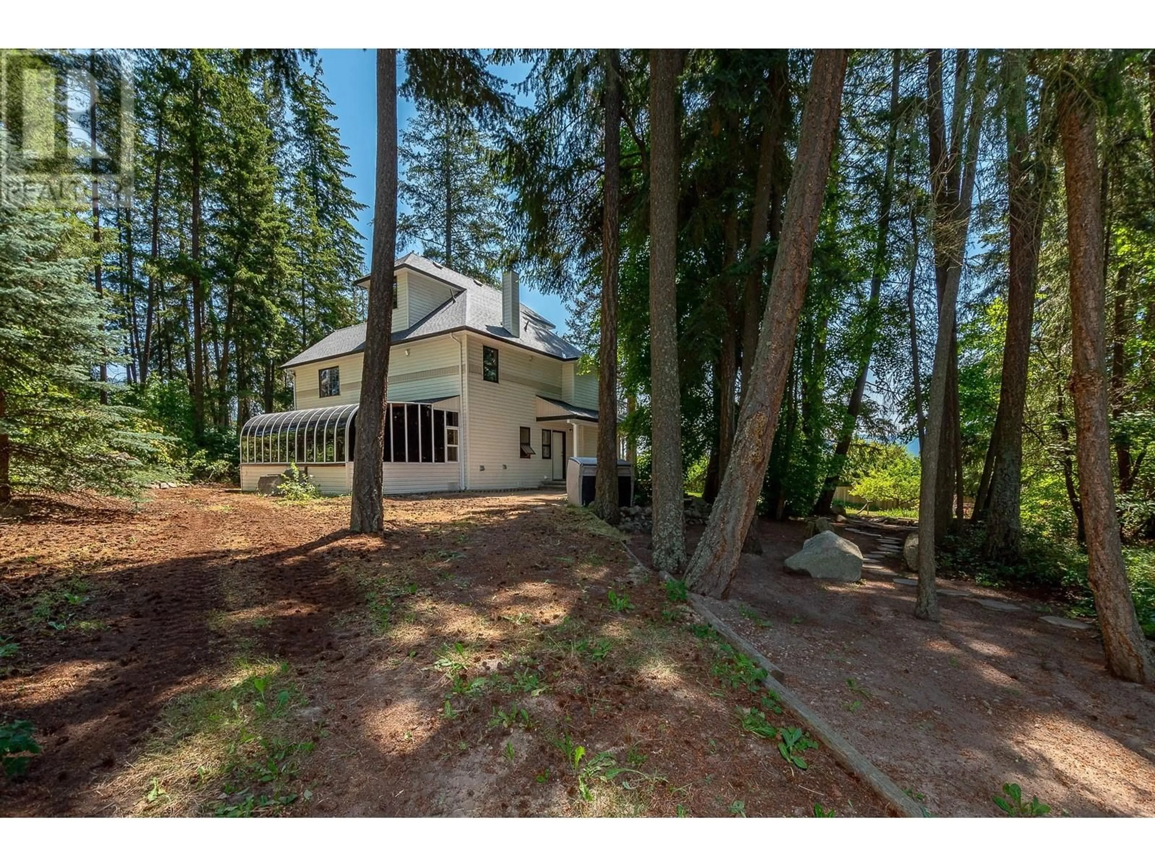 A pic from outside/outdoor area/front of a property/back of a property/a pic from drone, forest/trees view for 3461 30 Street NE, Salmon Arm British Columbia V1E3L1