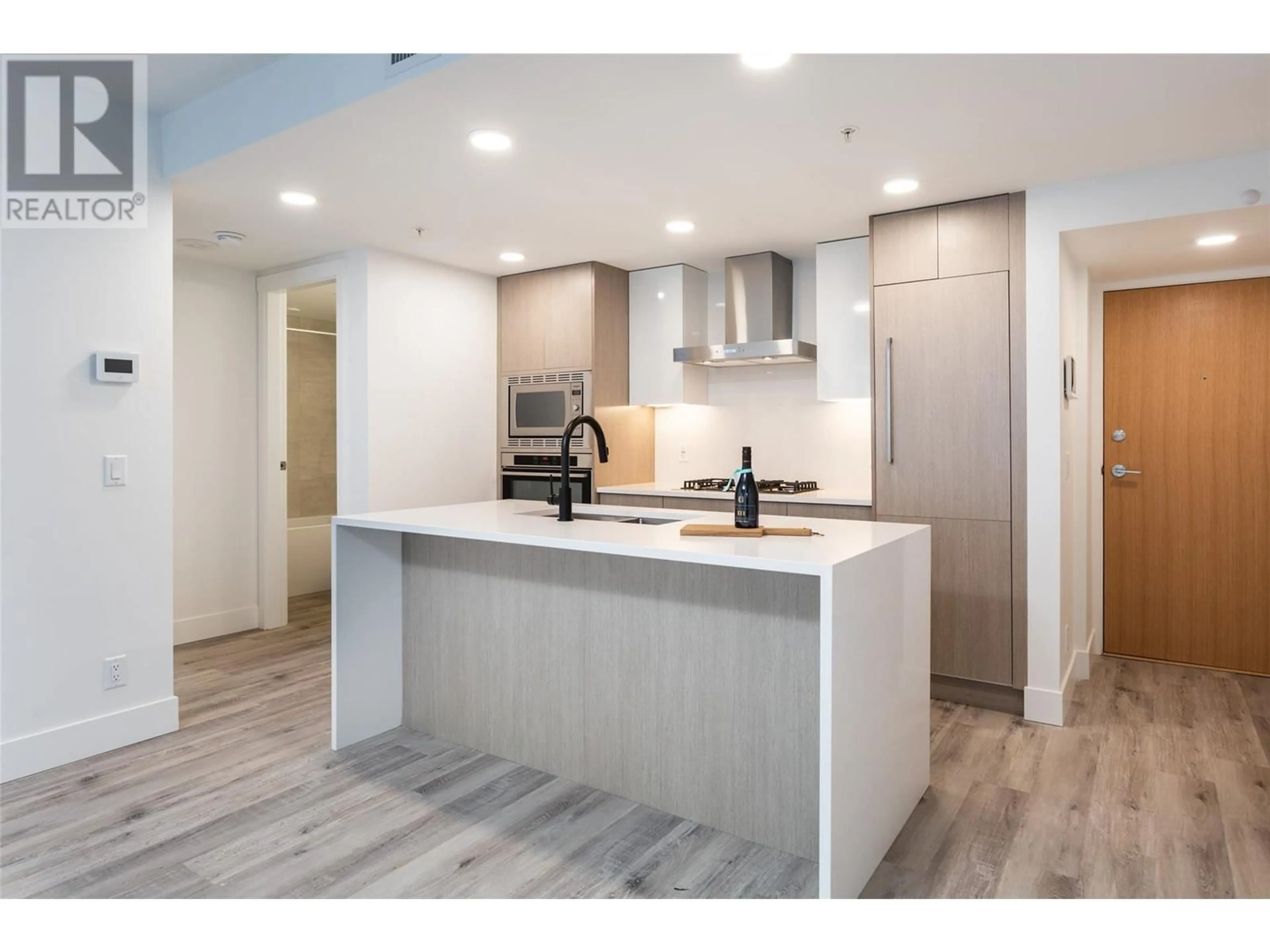 Open concept kitchen, unknown for 1588 Ellis Street Unit# 807, Kelowna British Columbia V1Y2A6