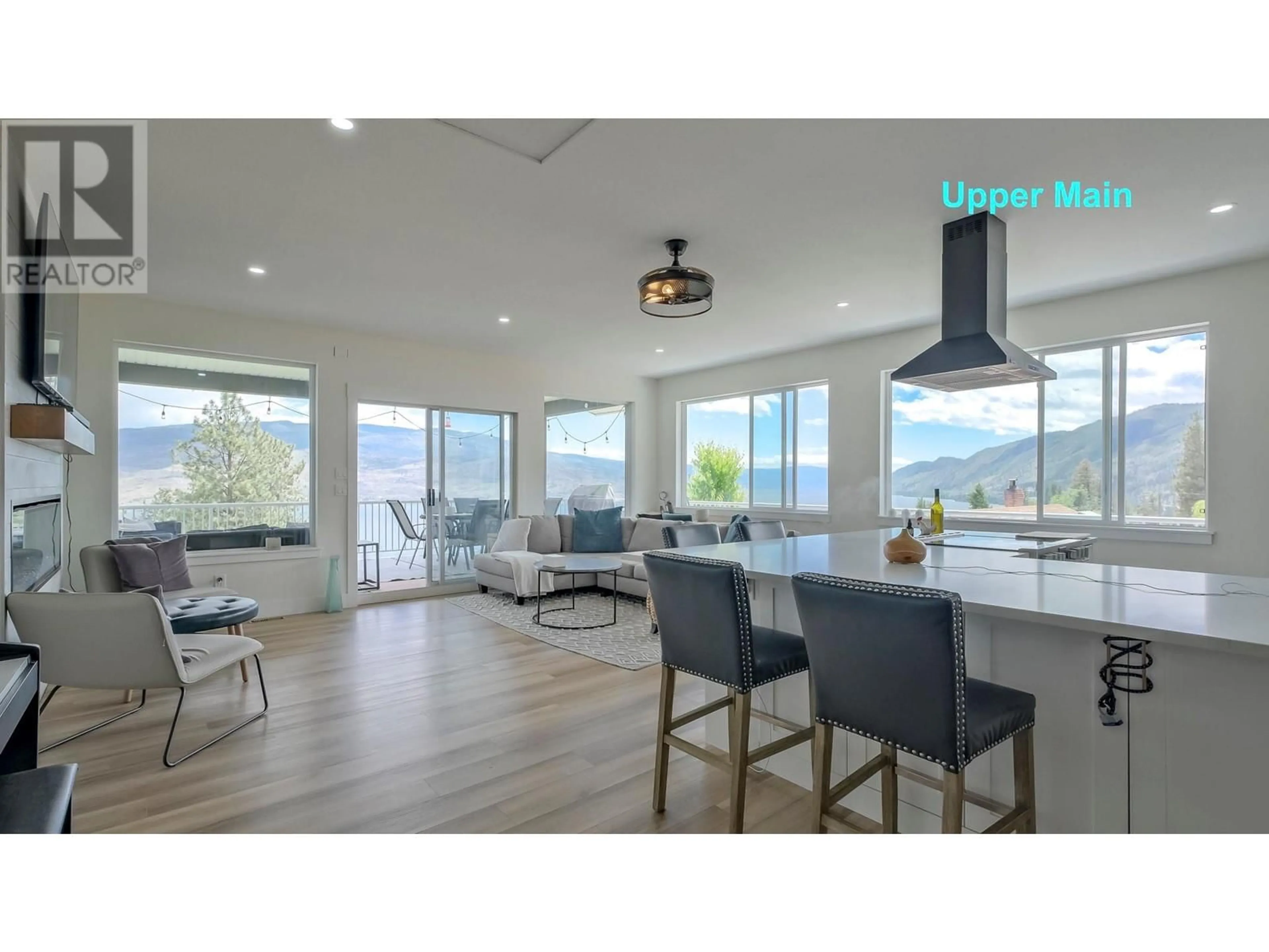 Open concept kitchen, wood/laminate floor for 6471 Vernon Avenue, Peachland British Columbia V0H1X8