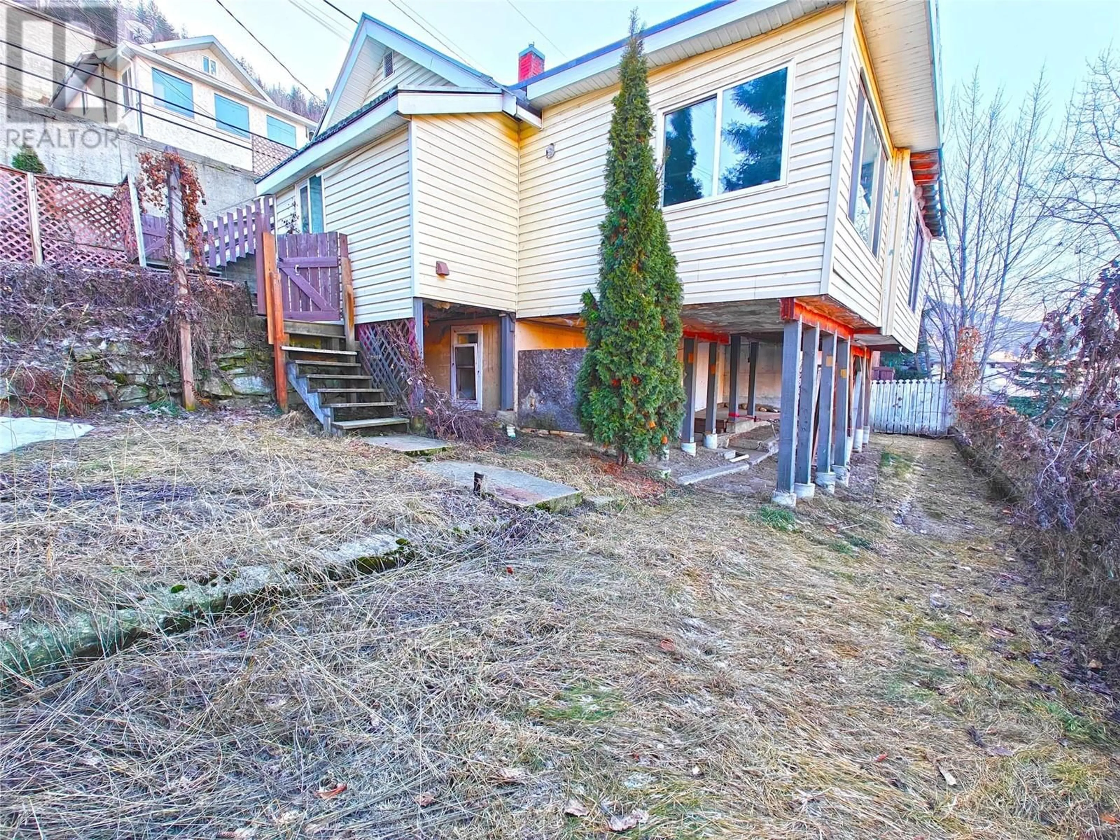 A pic from outside/outdoor area/front of a property/back of a property/a pic from drone, street for 2087 Topping Street, Trail British Columbia V1R4G6