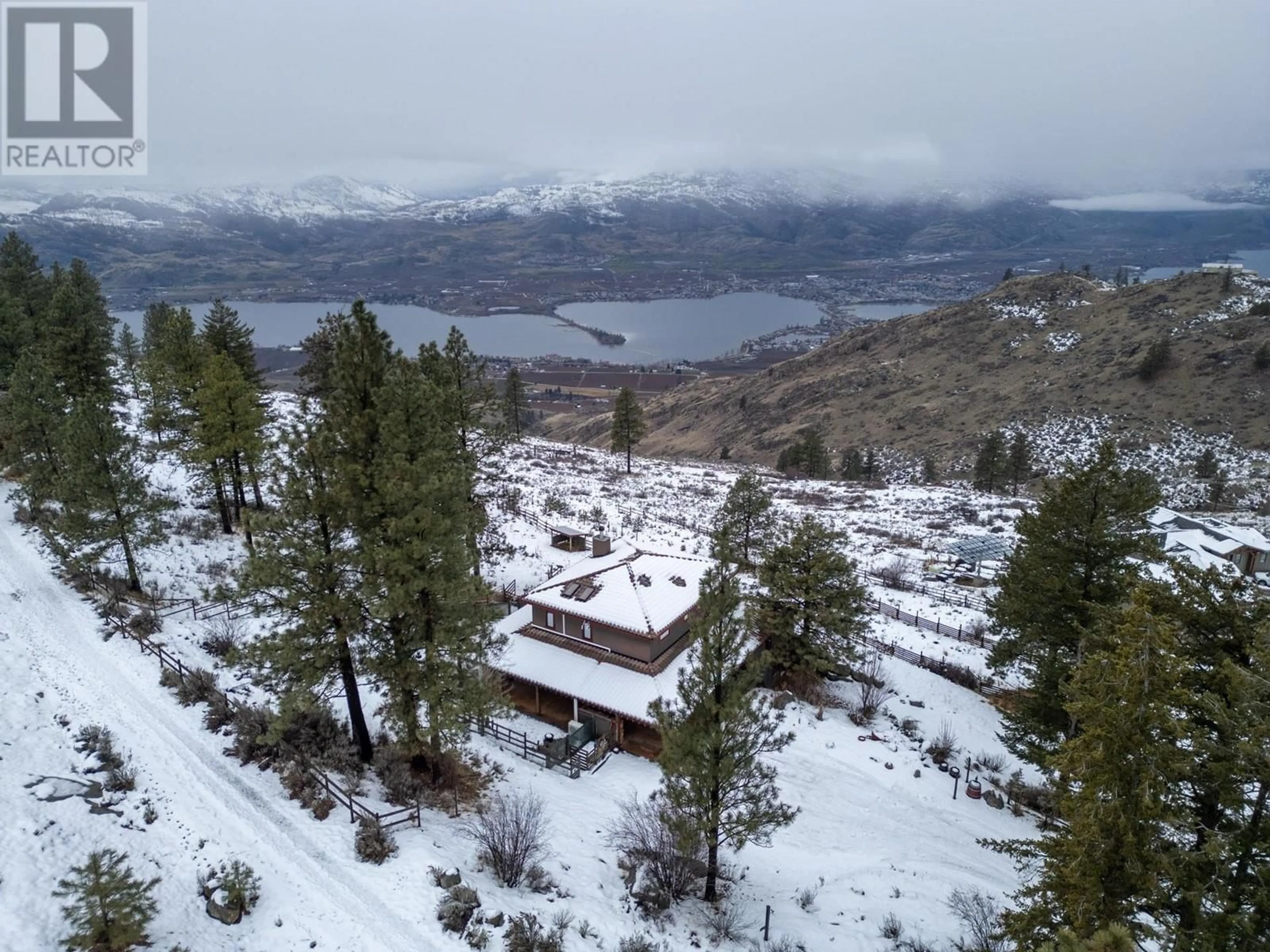 A pic from outside/outdoor area/front of a property/back of a property/a pic from drone, mountain view for 110 CHAPMAN ROAD, Osoyoos British Columbia V0H1V6