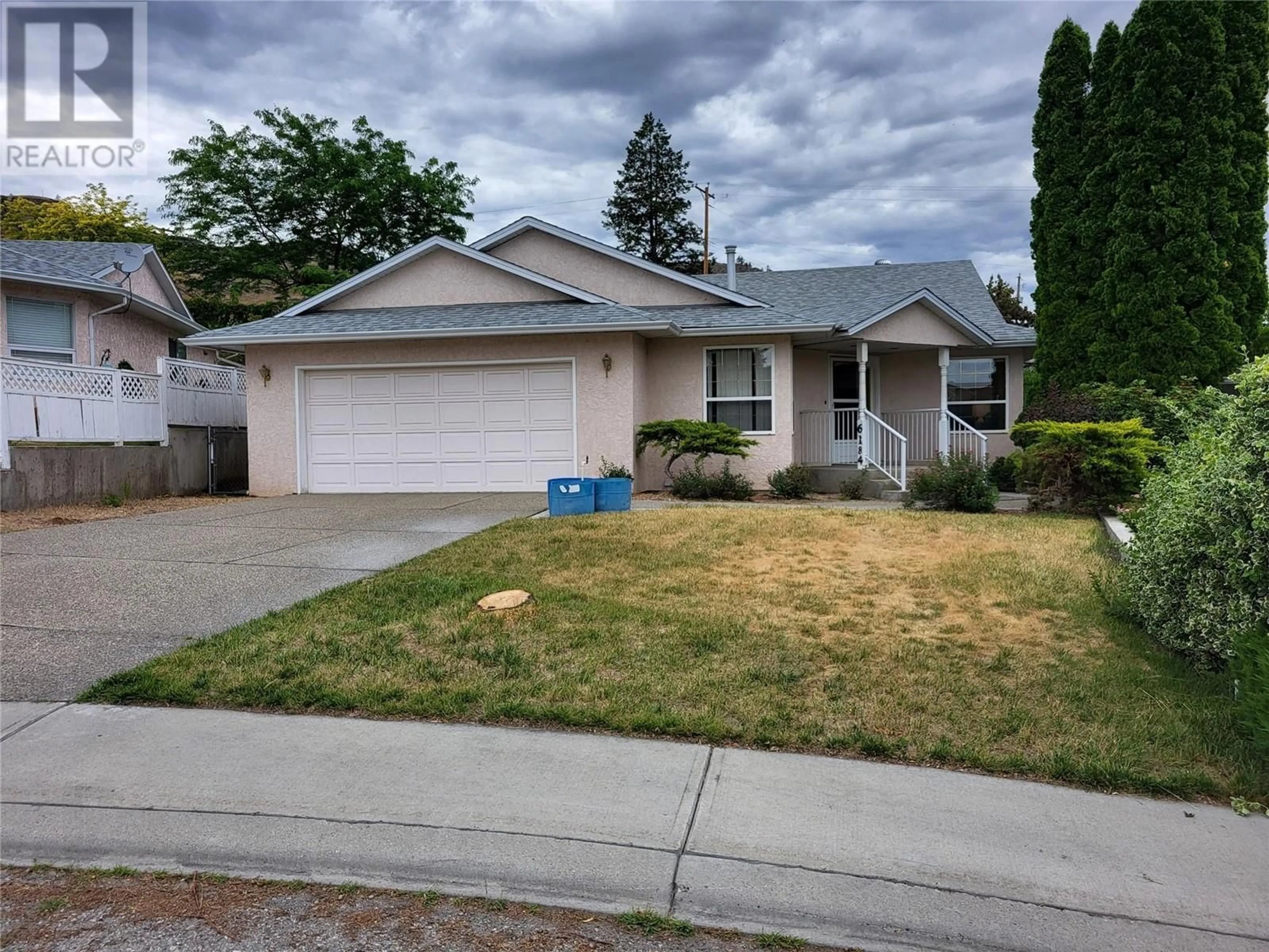 Home with vinyl exterior material, street for 6184 Saint Martin Place, Oliver British Columbia V0H1T0