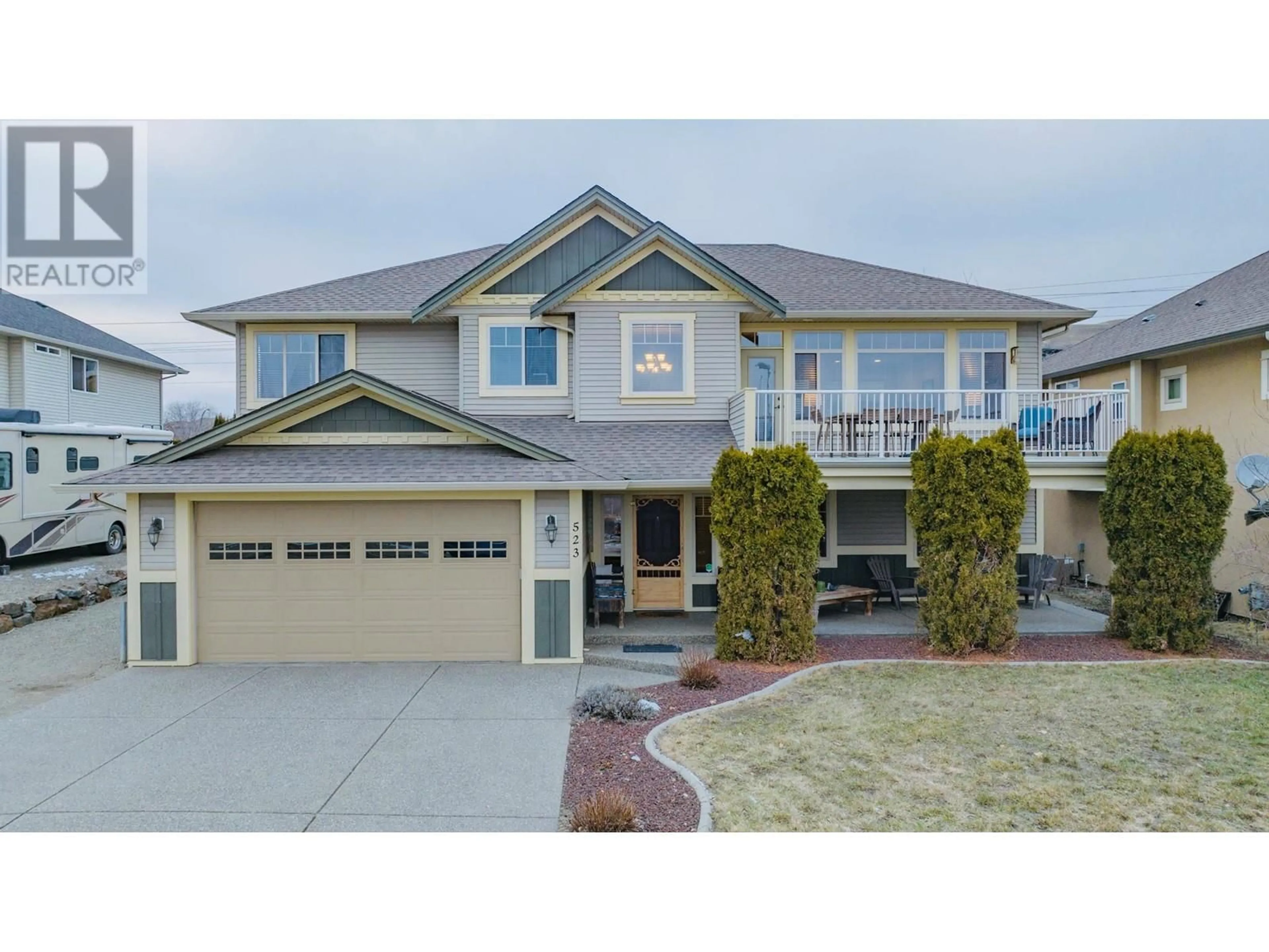 Home with vinyl exterior material, street for 523 Middleton Way, Coldstream British Columbia V1B3A3