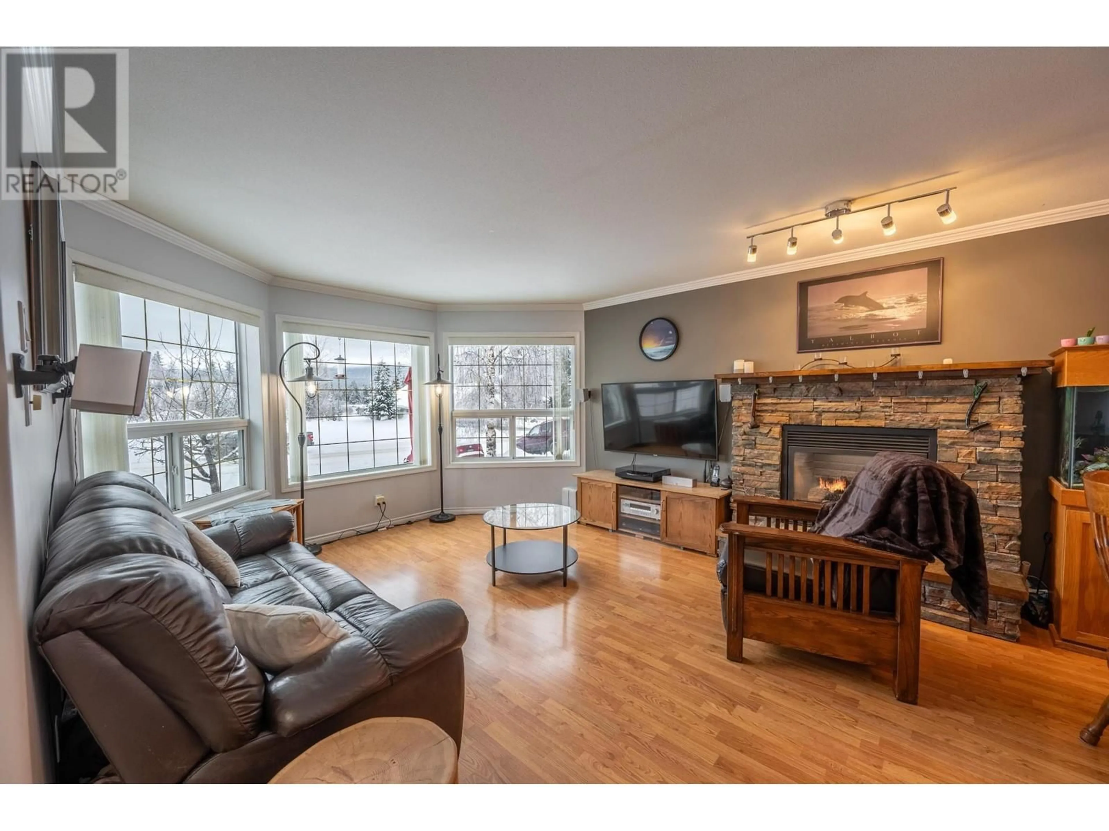 Living room with furniture, wood/laminate floor for 1505 Cedar Street, Golden British Columbia V0A1H6