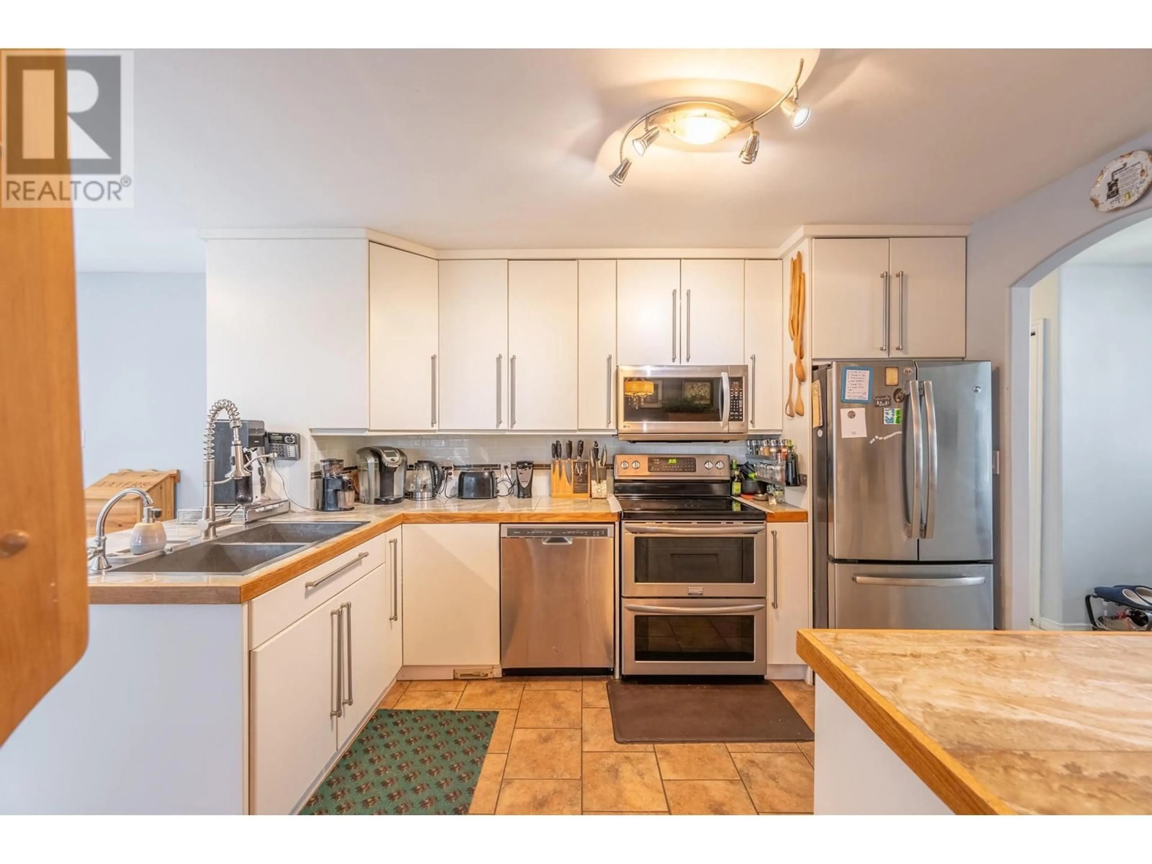 Standard kitchen, wood/laminate floor for 1505 Cedar Street, Golden British Columbia V0A1H6