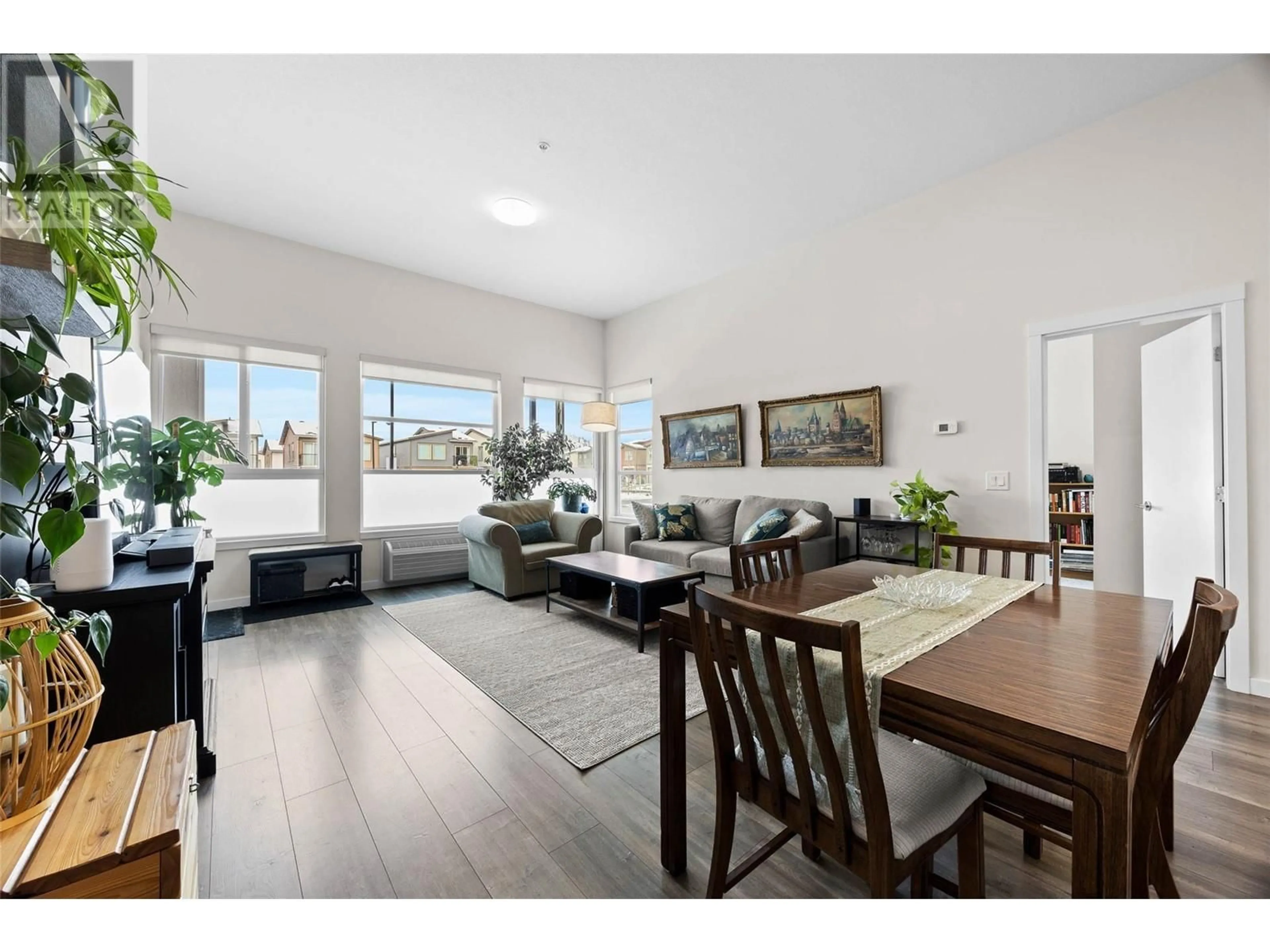 Living room with furniture, wood/laminate floor for 1880 HUGH ALLAN Drive Unit# 102, Kamloops British Columbia V1S0E8