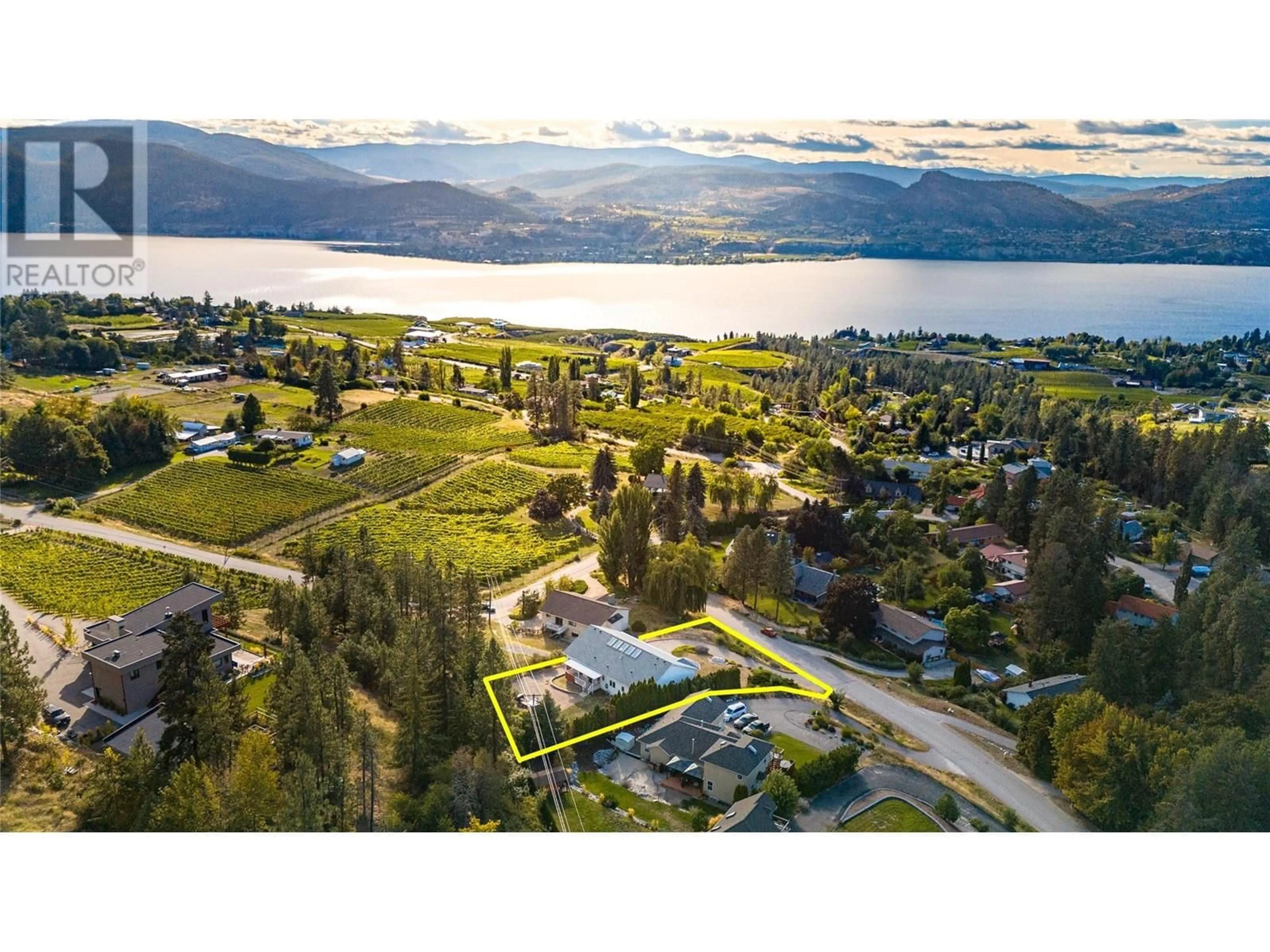 A pic from outside/outdoor area/front of a property/back of a property/a pic from drone, water/lake/river/ocean view for 3018 DEBECK ROAD, Naramata British Columbia V0H1N1
