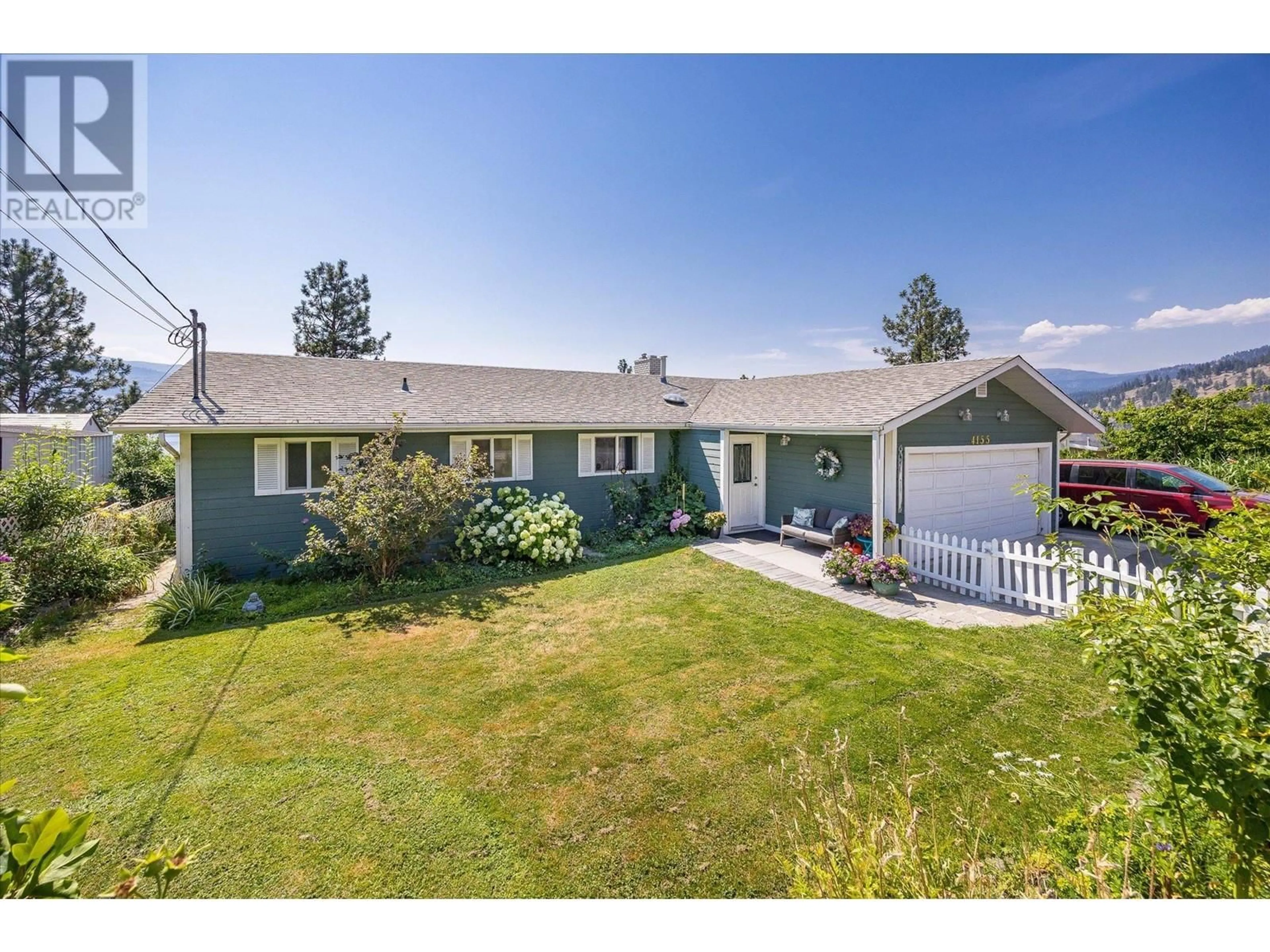 A pic from outside/outdoor area/front of a property/back of a property/a pic from drone, street for 4155 PONDEROSA DRIVE, Peachland British Columbia V0H1X5