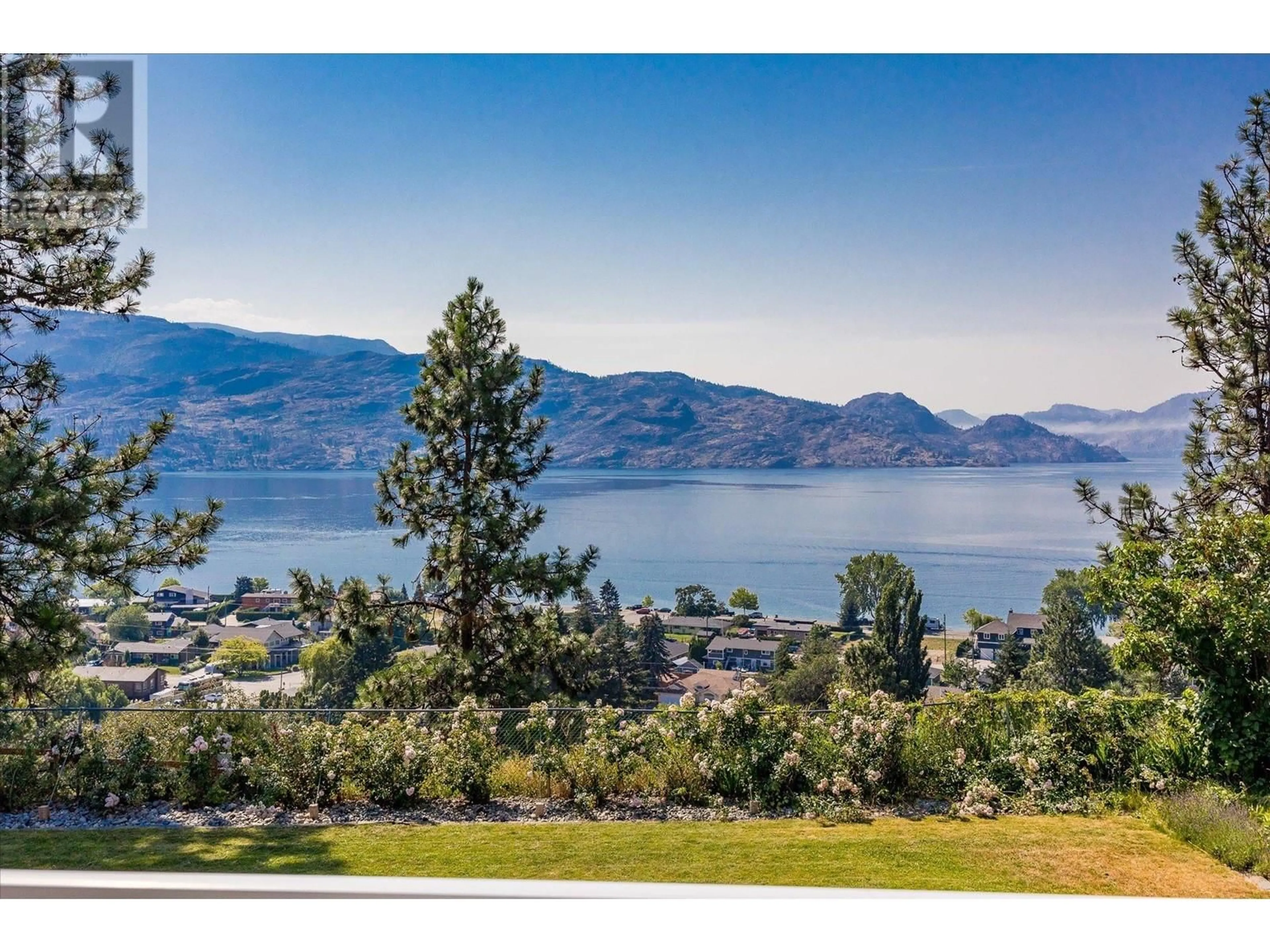 A pic from outside/outdoor area/front of a property/back of a property/a pic from drone, water/lake/river/ocean view for 4155 Ponderosa Drive, Peachland British Columbia V0H1X5