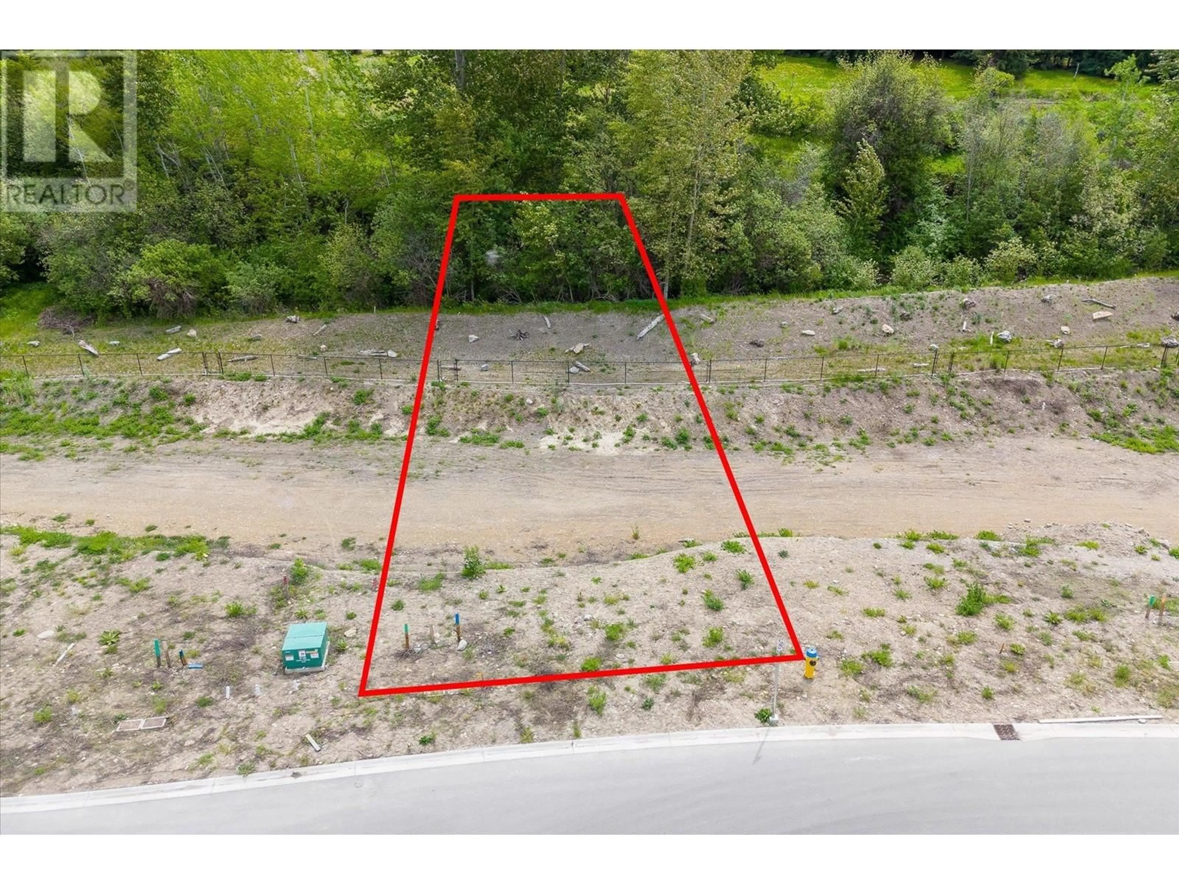 A pic from outside/outdoor area/front of a property/back of a property/a pic from drone, unknown for 980 BULL CRESCENT, Kelowna British Columbia V1W0E6