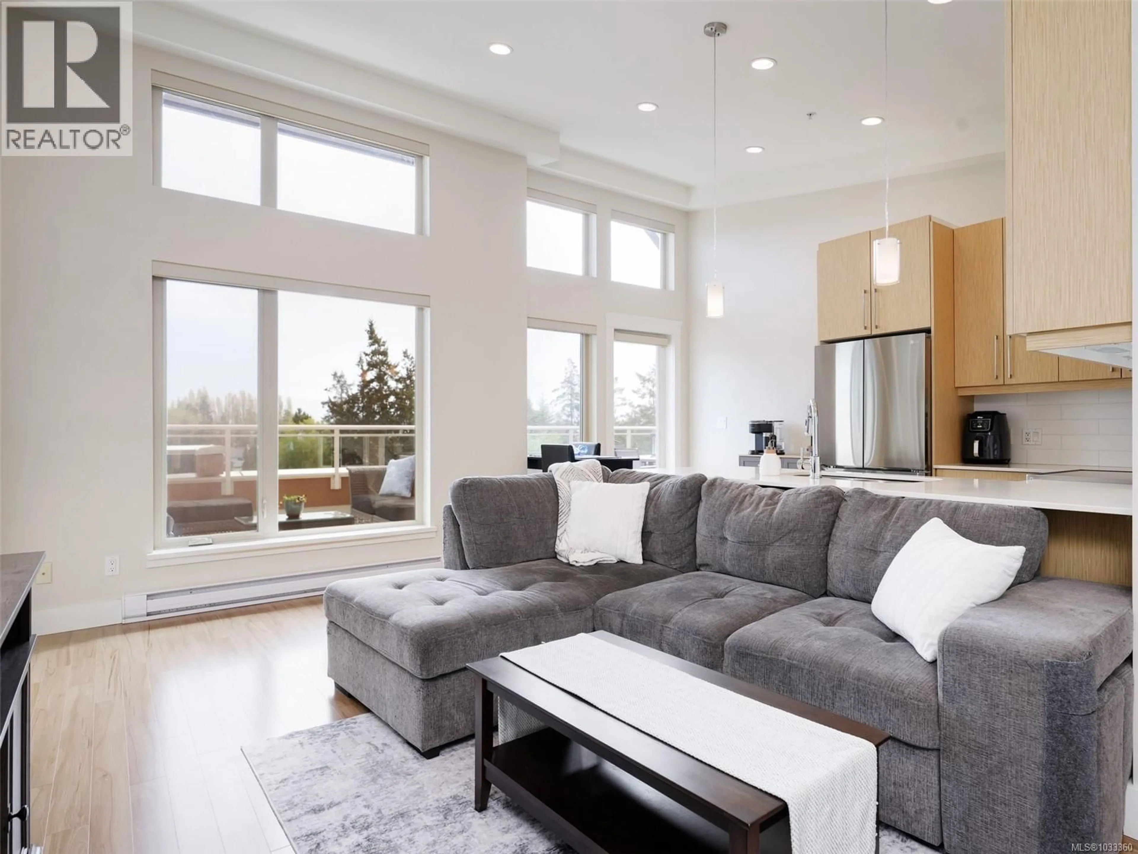 Living room with furniture, unknown for 401 - 7161 WEST SAANICH ROAD, Central Saanich British Columbia V8M1P7