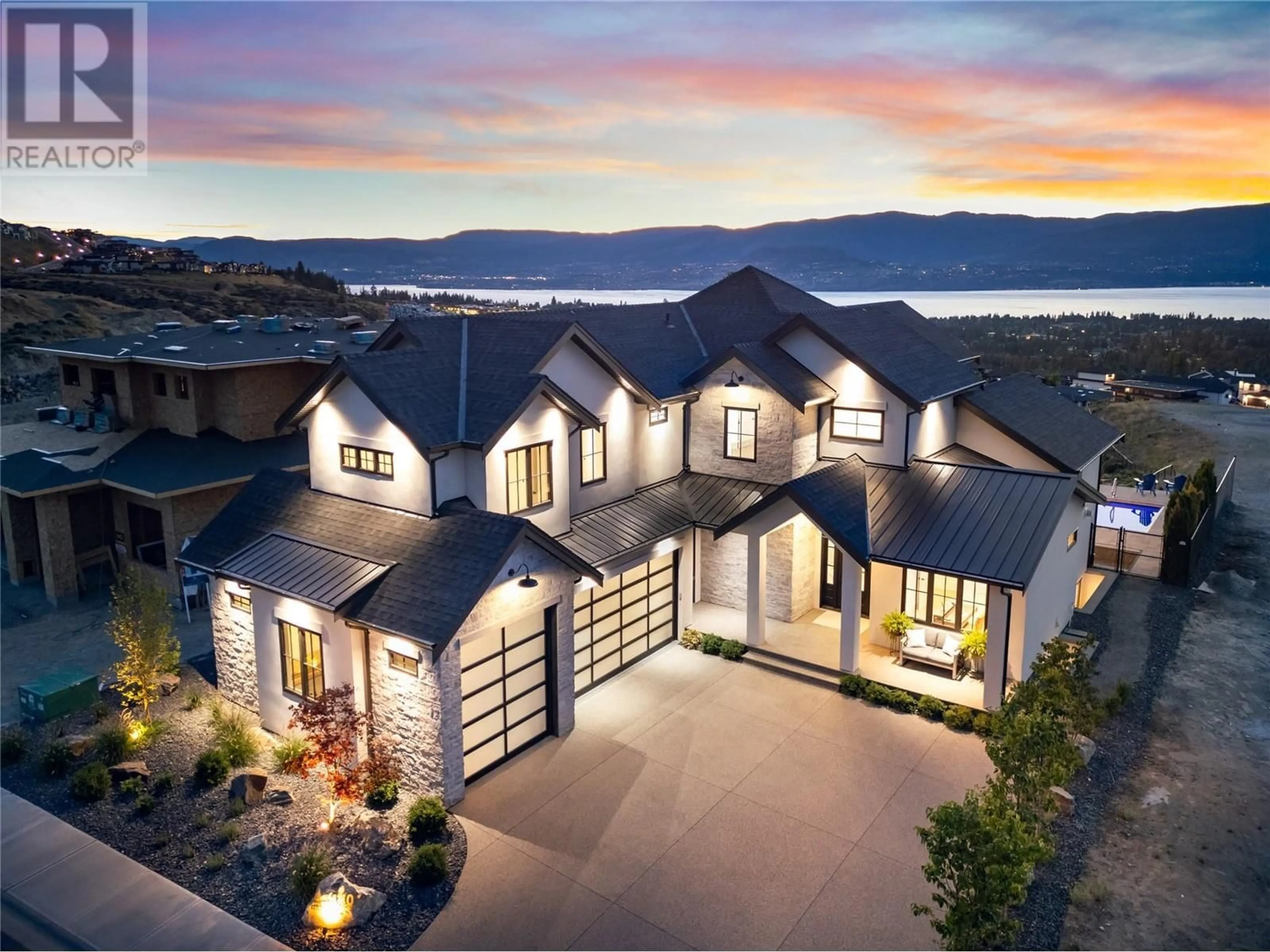 Home with vinyl exterior material, mountain view for 1440 Hill Spring Place, Kelowna British Columbia V1W0E5